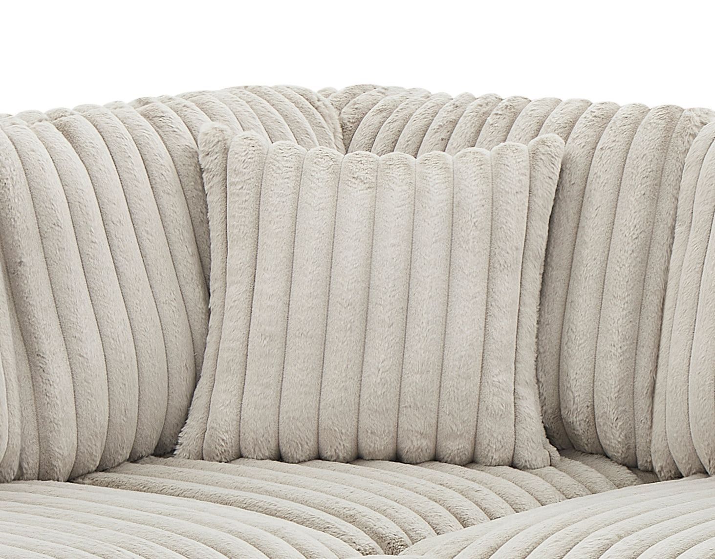 Plush cream corduroy cushion with vertical ribbing texture for a cozy sofa accent