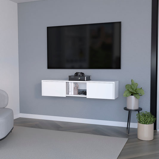 White floating TV stand with open shelves holding books and gaming accessories