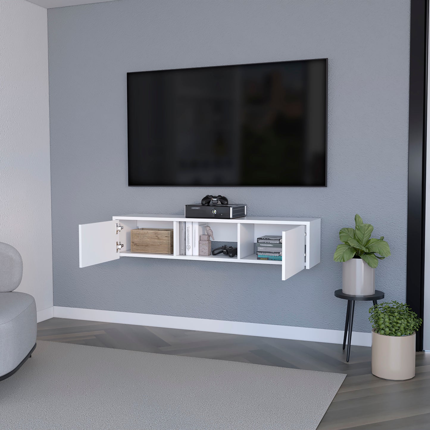 Modern white wallmounted entertainment center with storage shelves for media consoles and controllers