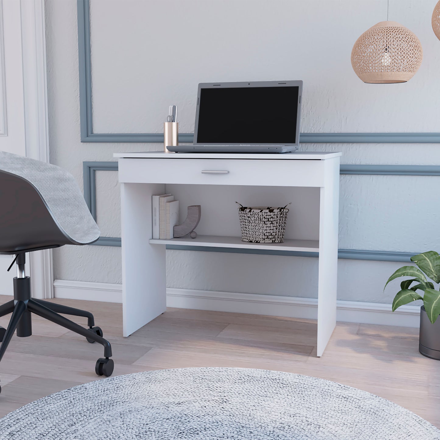 White compact desk with drawer shelf and laptop for a home office setup