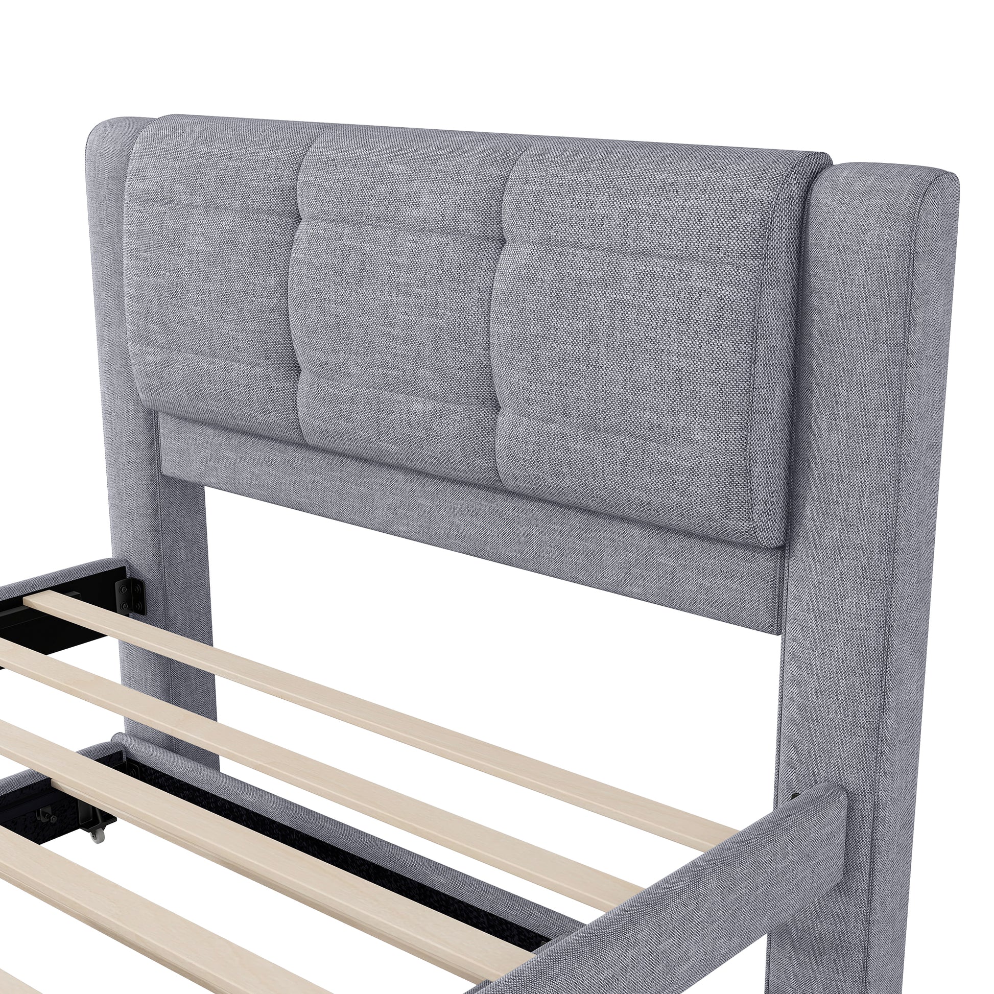 Gray upholstered headboard with tufted panels and a wooden slat bed frame