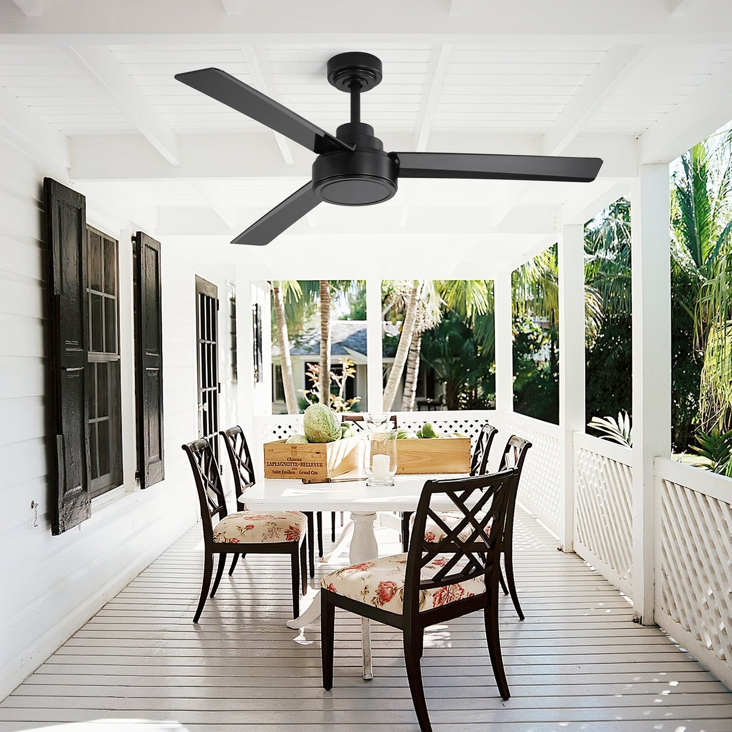 Modern black ceiling fan with three blades on a white porch ceiling for outdoor living