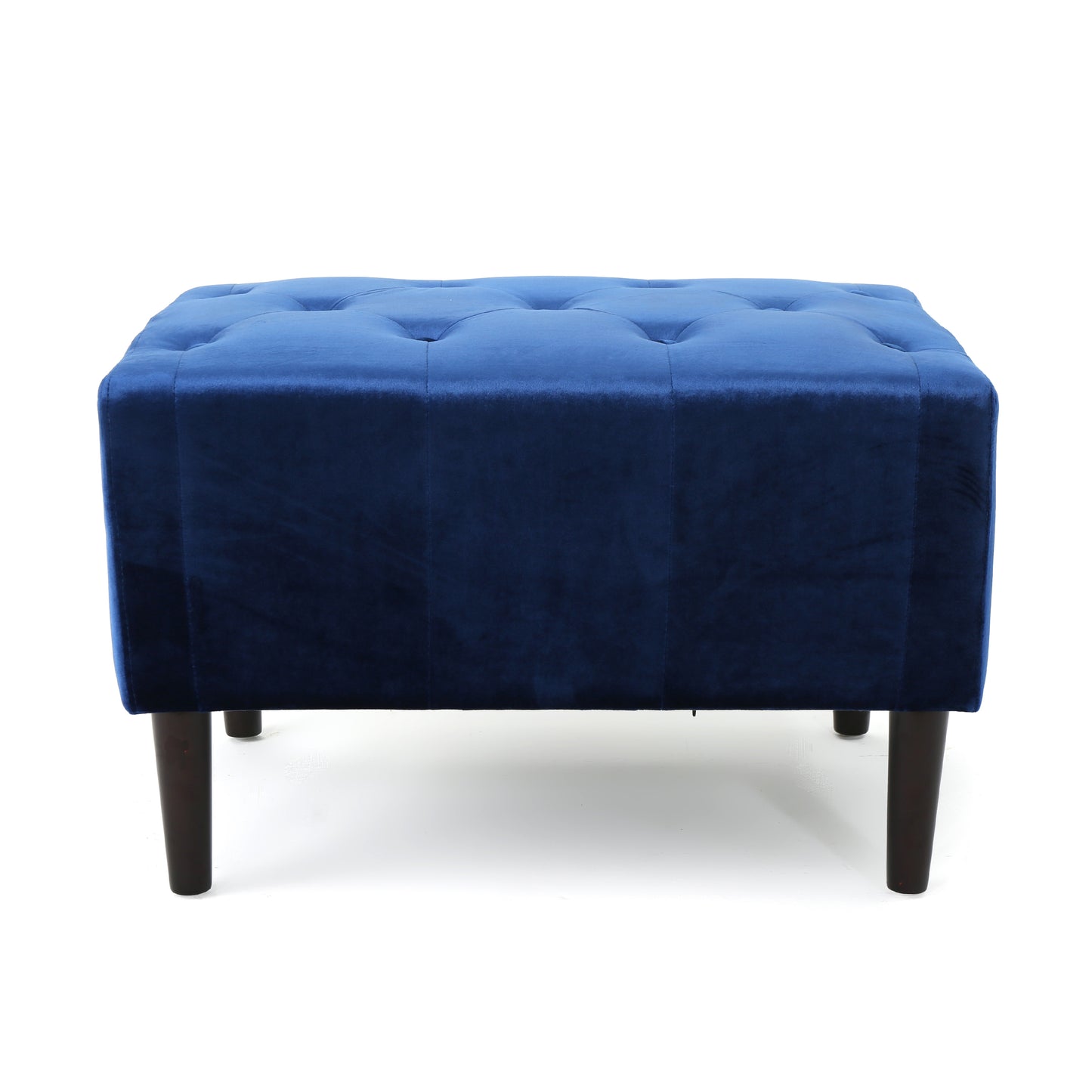 Deep blue velvet ottoman with tufted top and dark wooden legs
