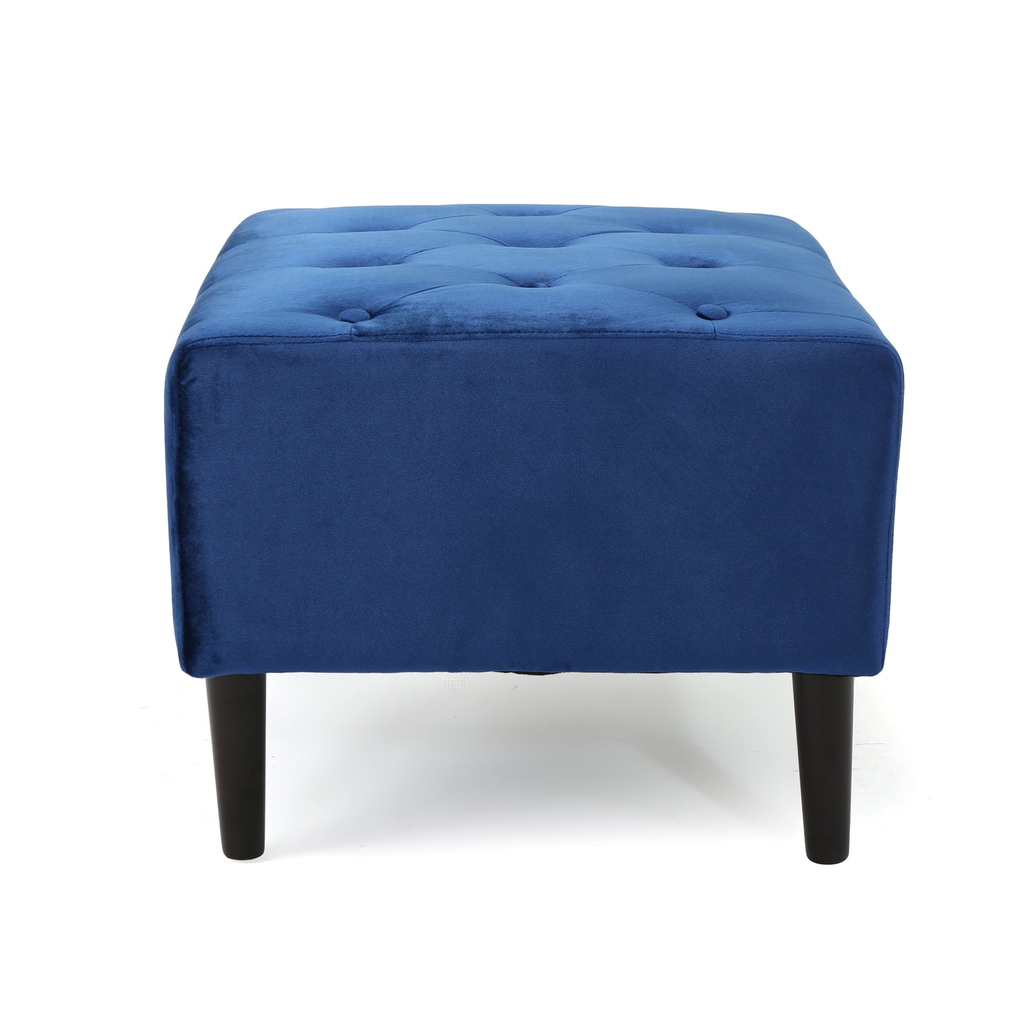 Tufted navy velvet ottoman with dark tapered legs perfect for footrest or extra seating