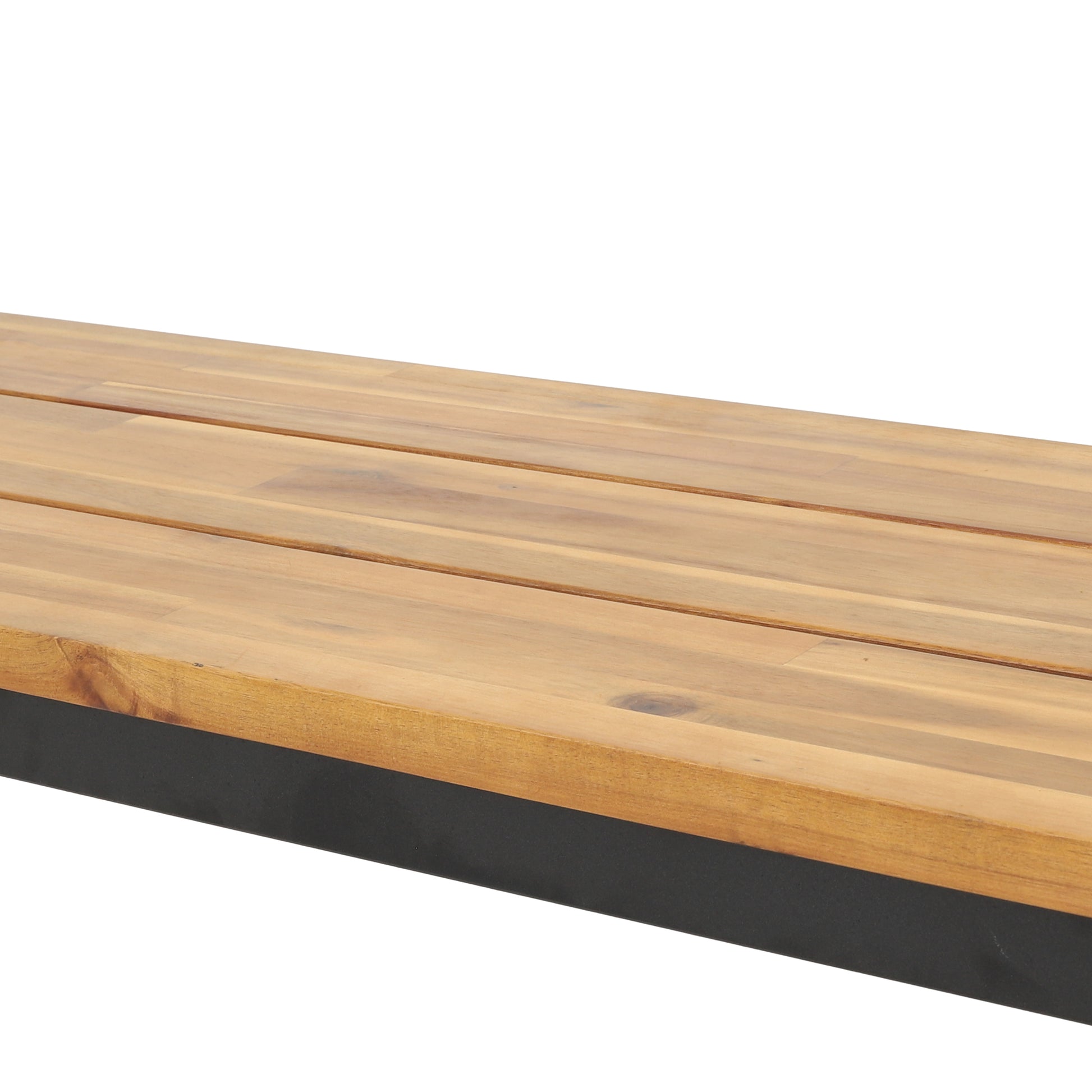 Closeup of a natural wood bench surface with slatted design and black metal base
