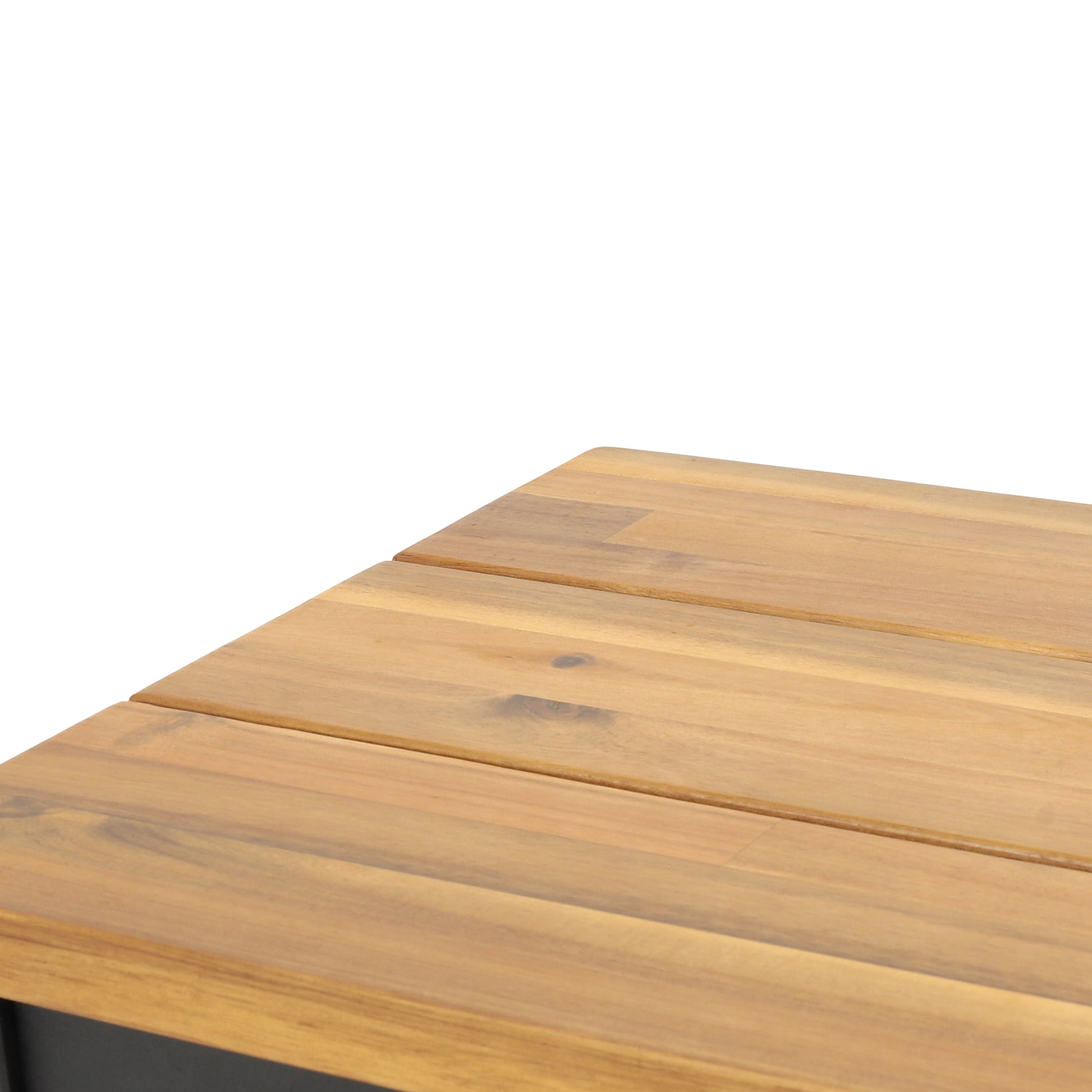 Closeup of a natural wood coffee table surface with visible grain and planks