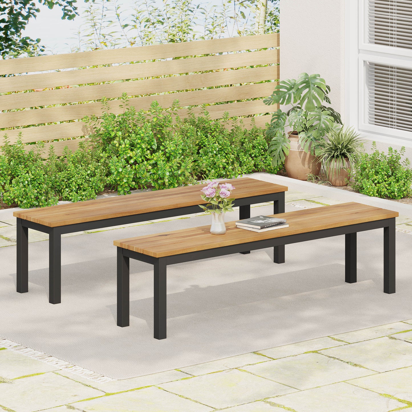 Modern outdoor bench with natural wood slats and black metal frame on patio