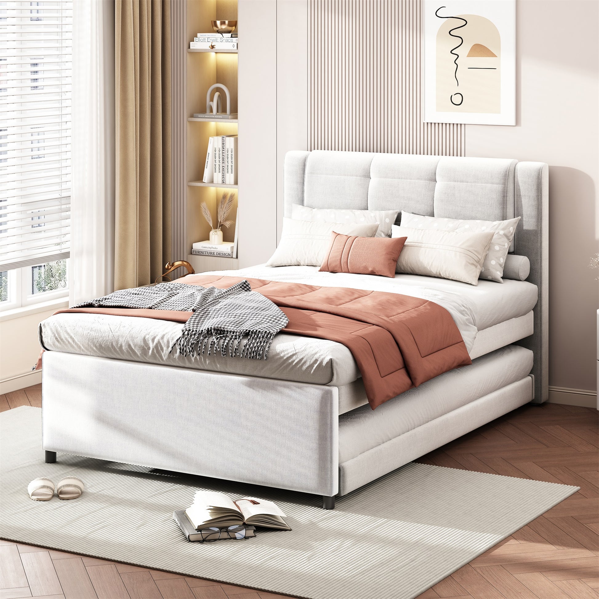 Modern grey upholstered bed frame with a pullout trundle for guest sleeping