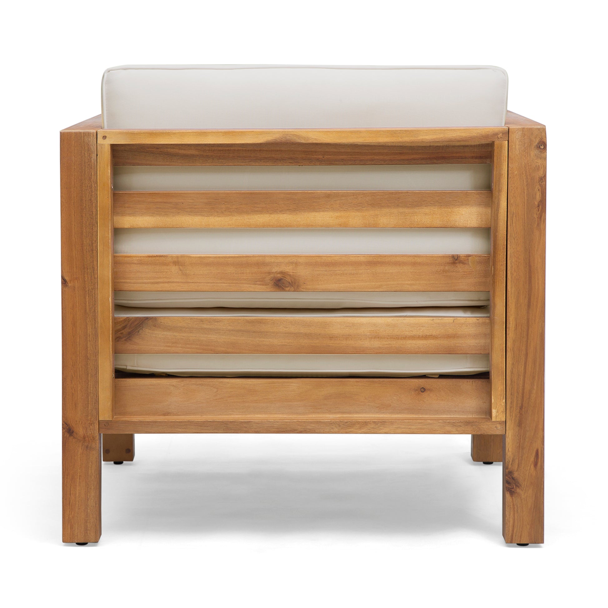 Back view of a slatted acacia wood armchair with cream cushions for outdoor seating