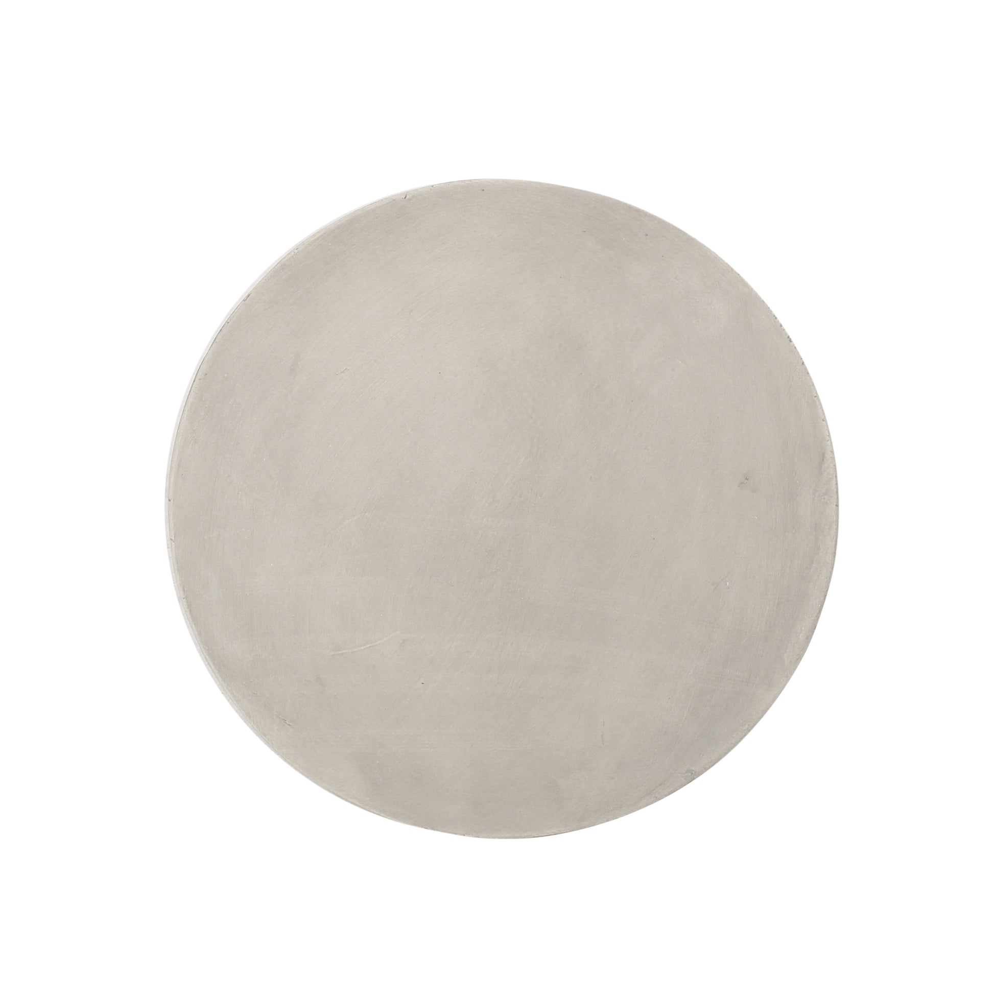 Round concrete serving tray with textured surface