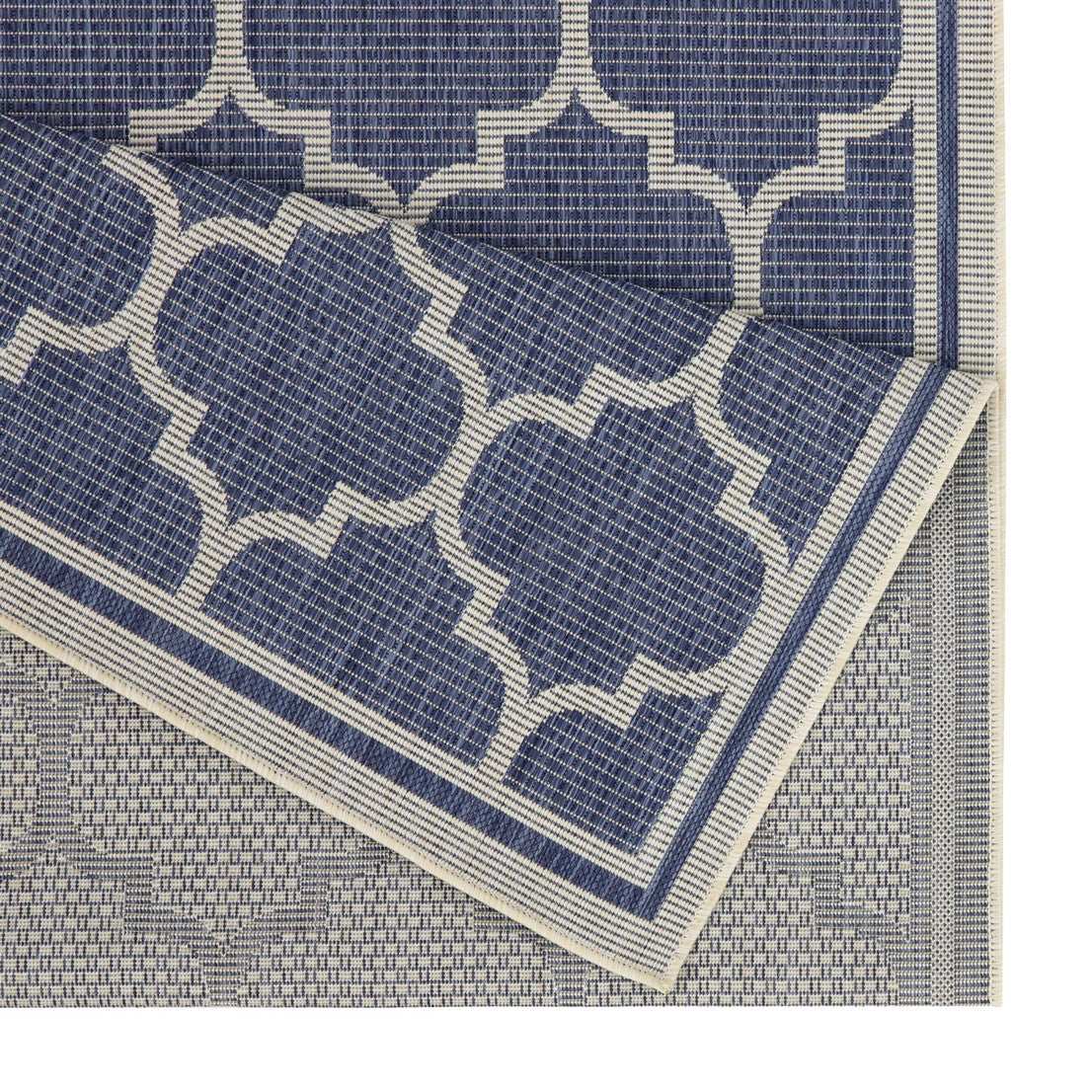 Blue and white geometric trellis pattern outdoor rug