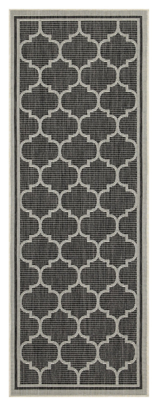Dark grey and white trellis pattern outdoor rug made from durable woven material