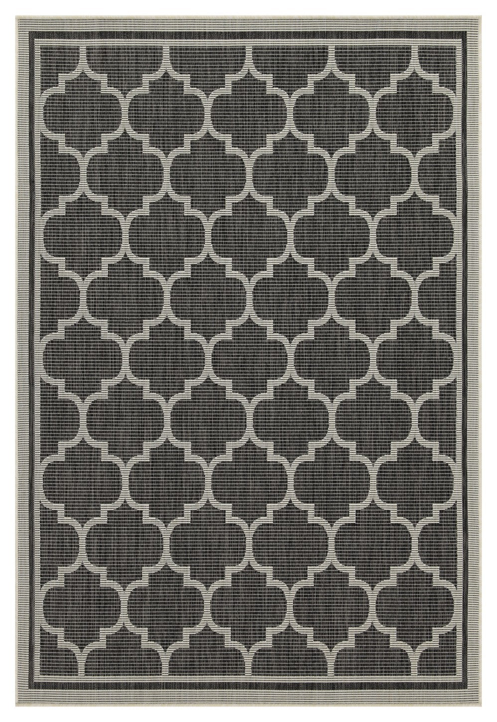Charcoal grey outdoor rug with a white quatrefoil geometric pattern and striped border