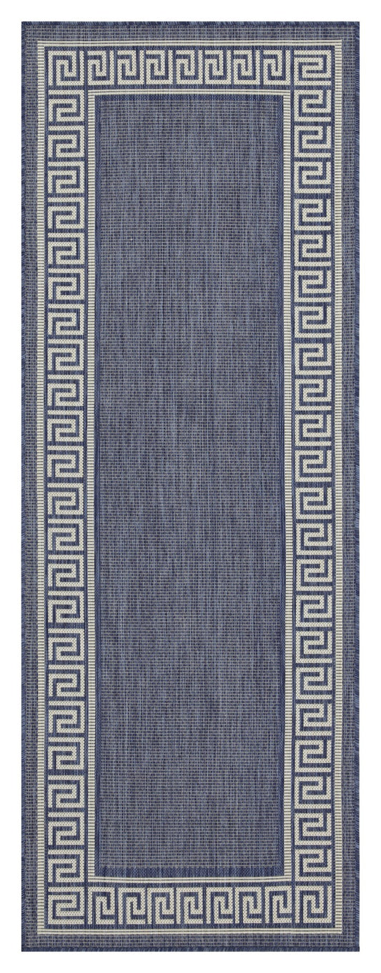 Navy blue outdoor rug with beige Greek key border pattern