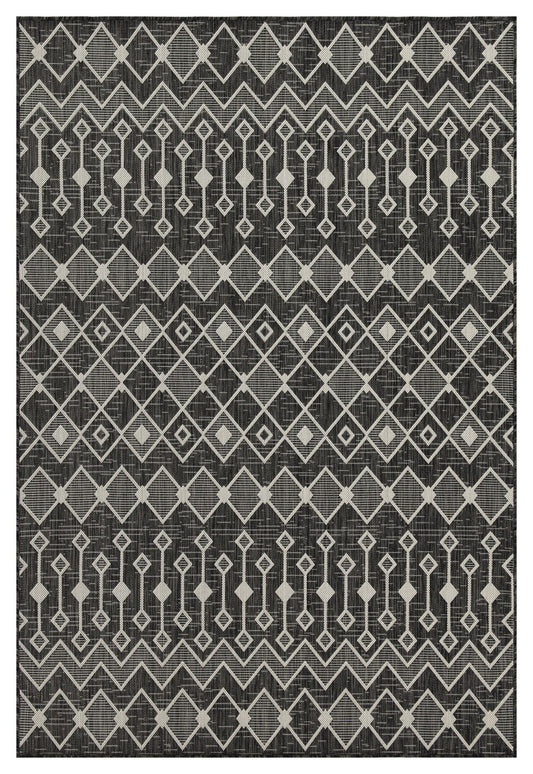 Geometric pattern black and white indoor rug with diamond accents