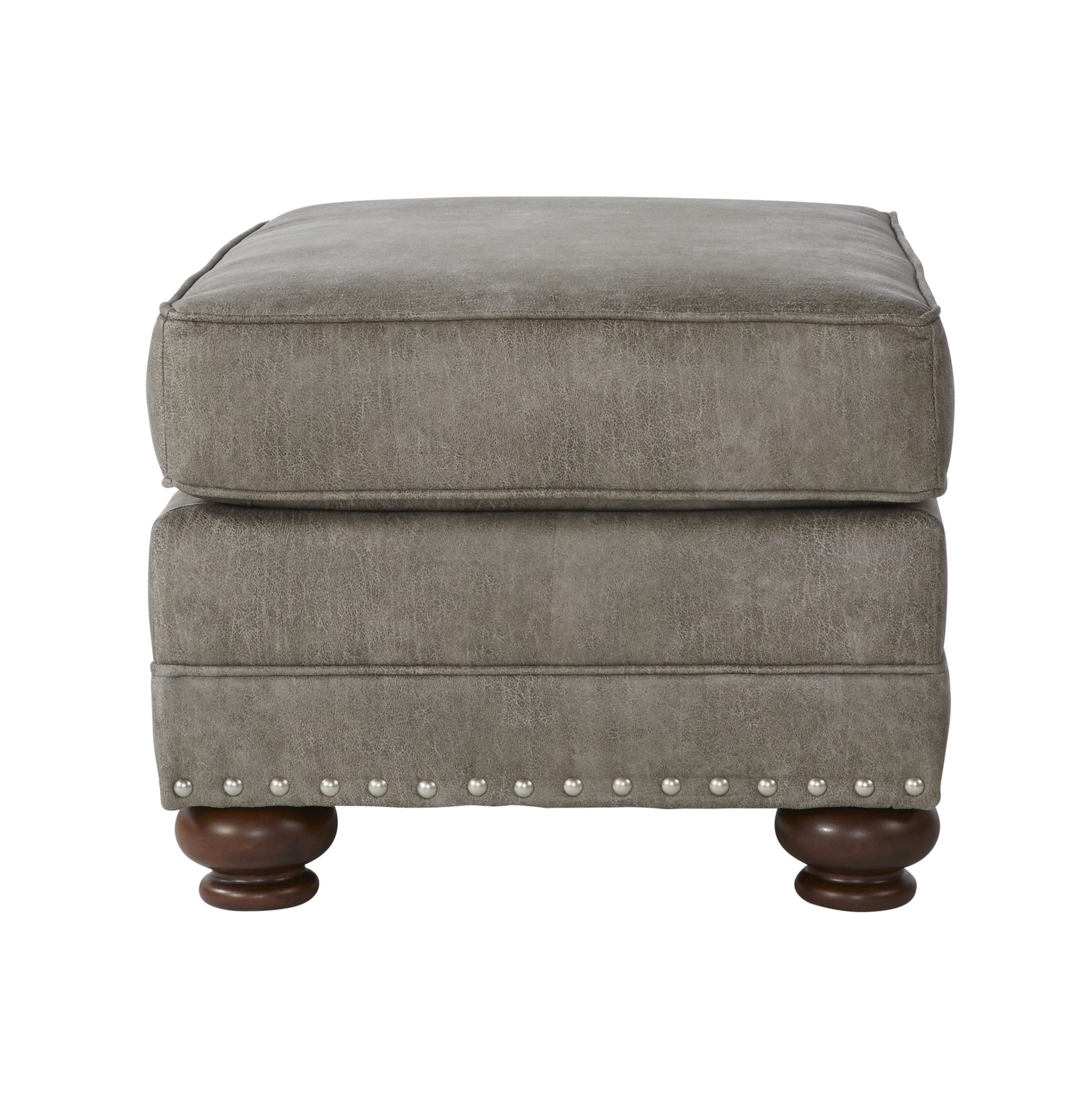 Tufted grey faux leather ottoman with nailhead trim and wooden bun feet