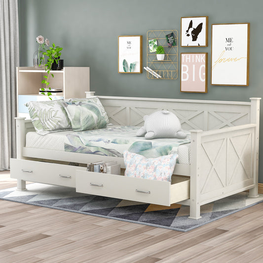 White wooden daybed with Xframe detailing and two drawers