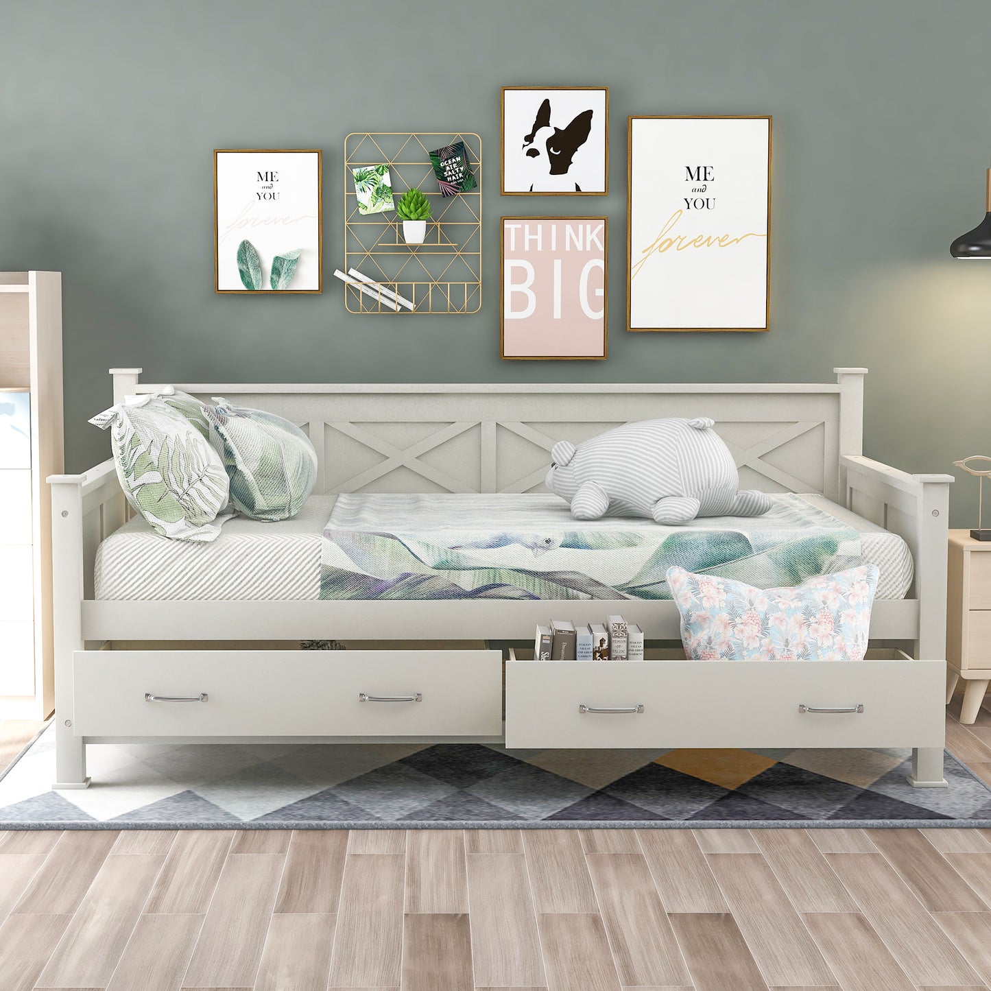 White wooden daybed with floral pillows and drawers