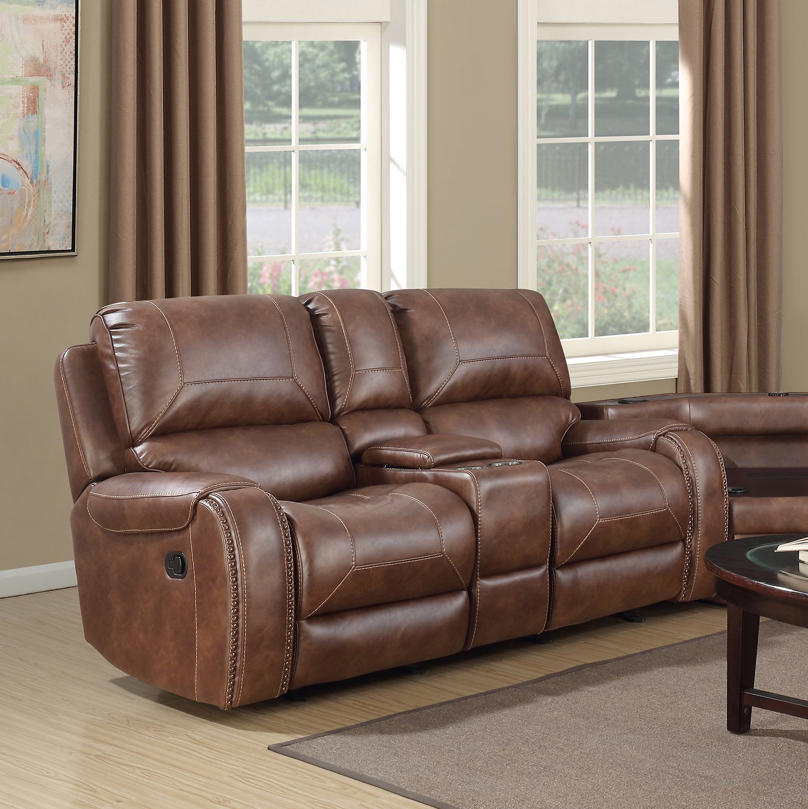 Brown leather loveseat recliner with two cup holders and decorative nailhead trim