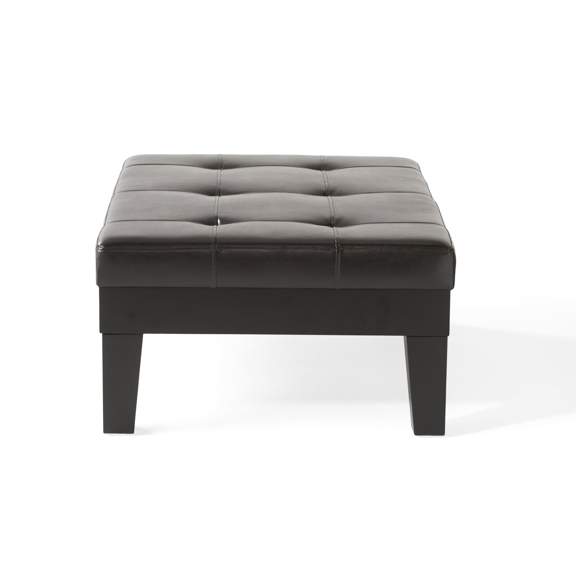 Dark brown faux leather tufted ottoman with squared legs perfect for living room seating