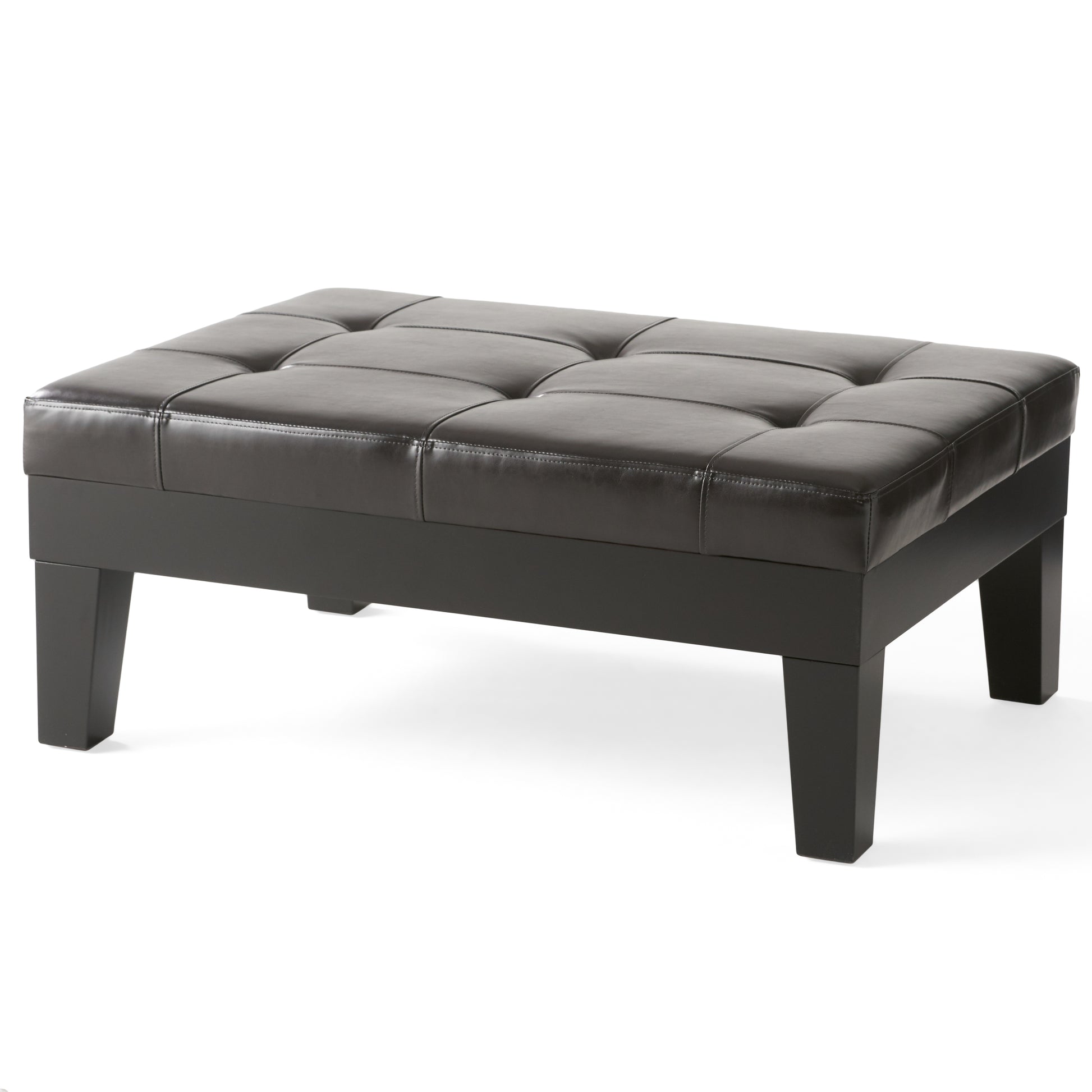 Dark brown faux leather tufted ottoman with dark wood legs