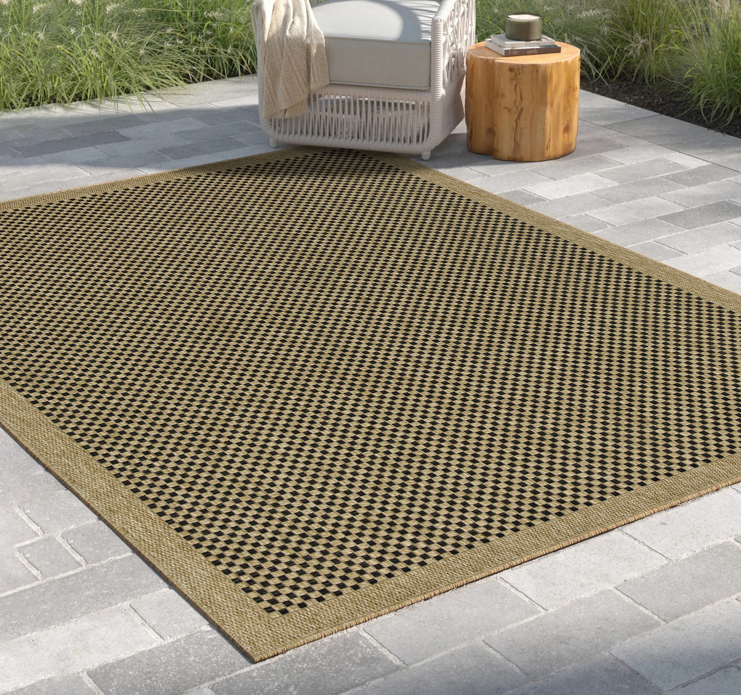 Brown and black diamond pattern outdoor rug with woven texture