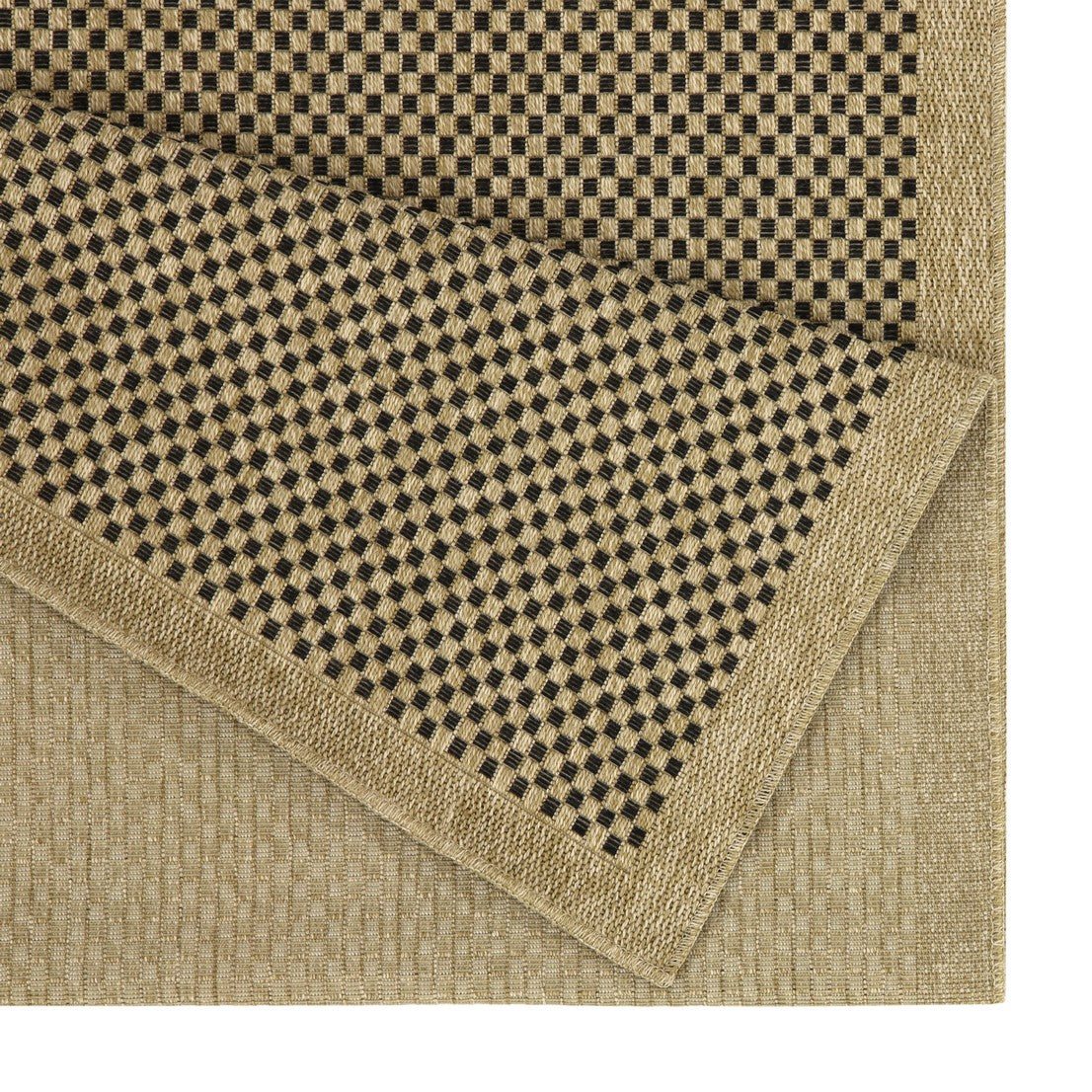 Closeup of a textured beige and black checkered doormat with woven edges