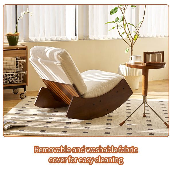 Cream upholstered rocking chair with wooden curved base and armrests