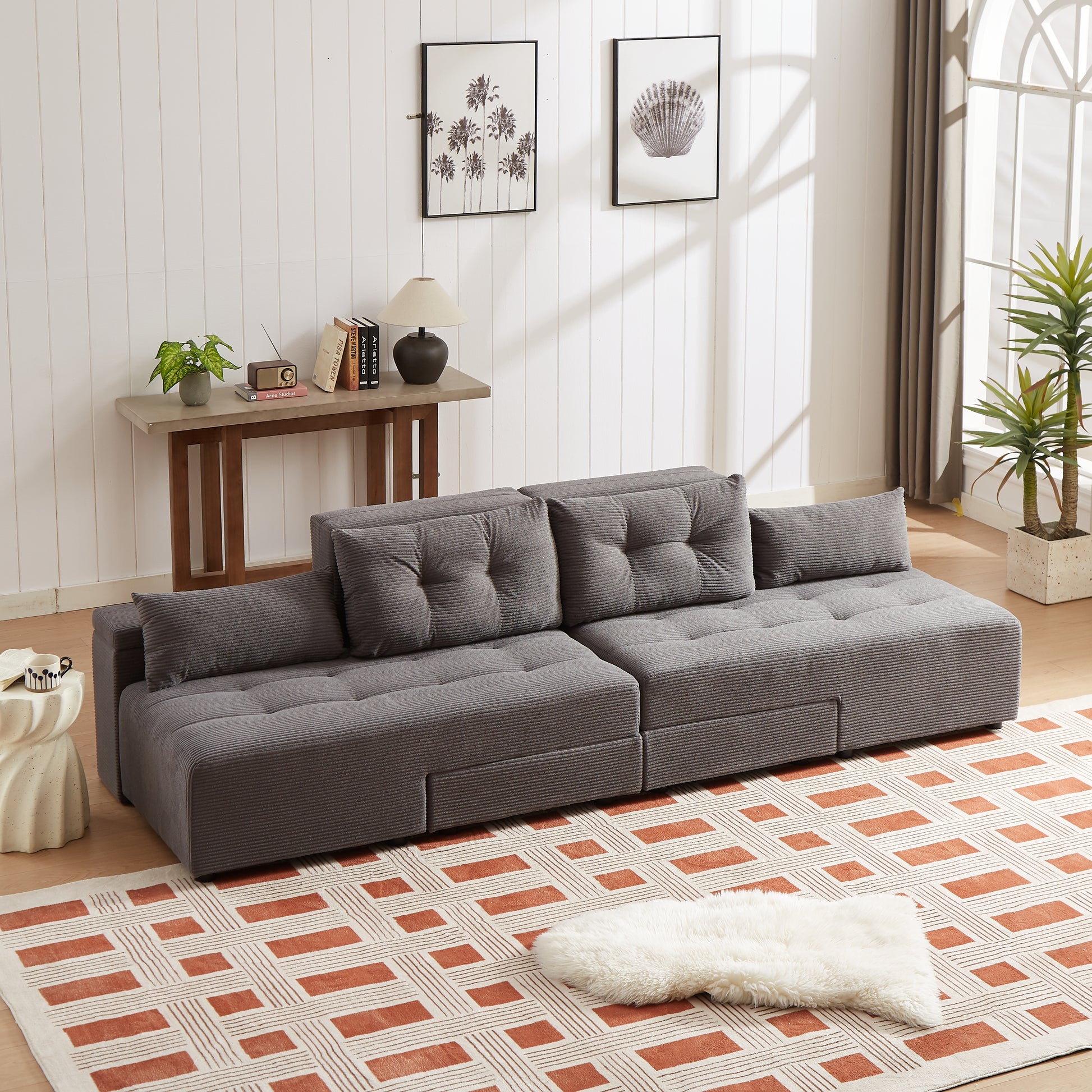 Modular grey corduroy sofa with tufted cushions perfect for modern living rooms