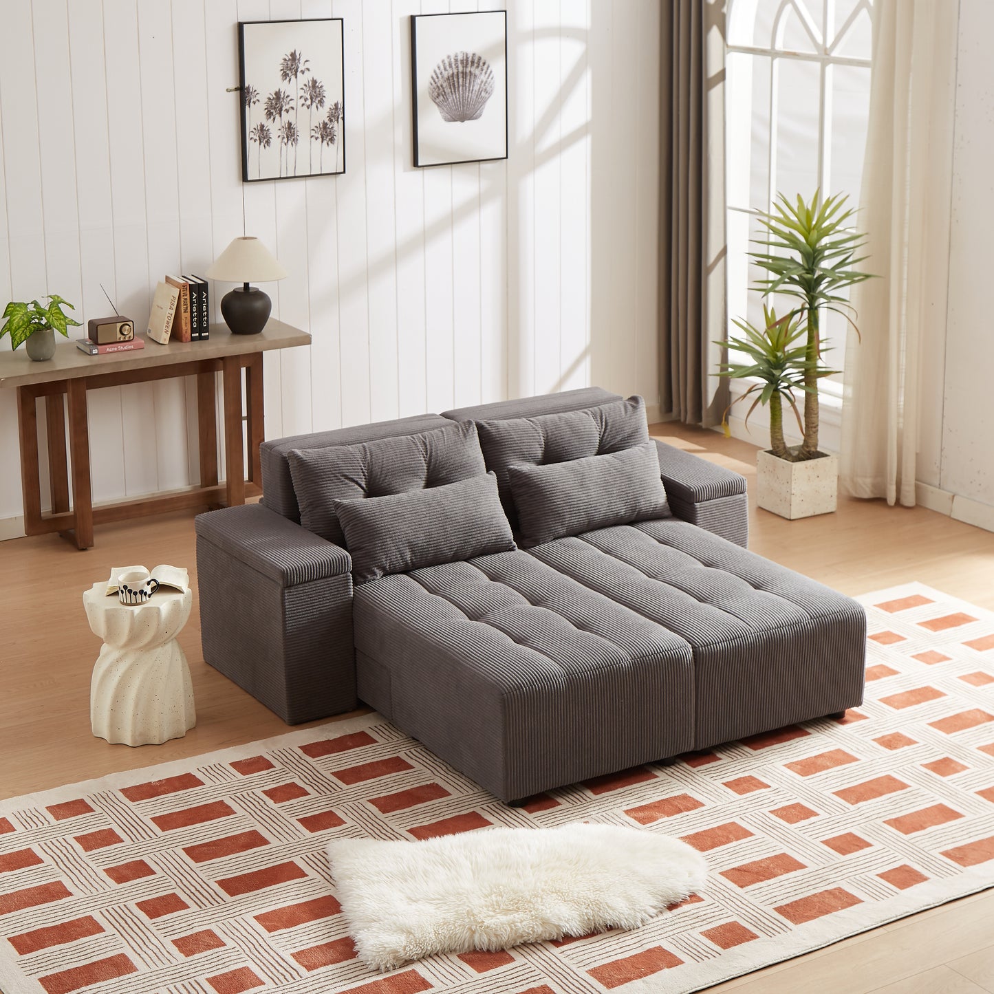 Deep grey corduroy sectional sofa with plush cushions offering a modern and comfortable living room seating solution