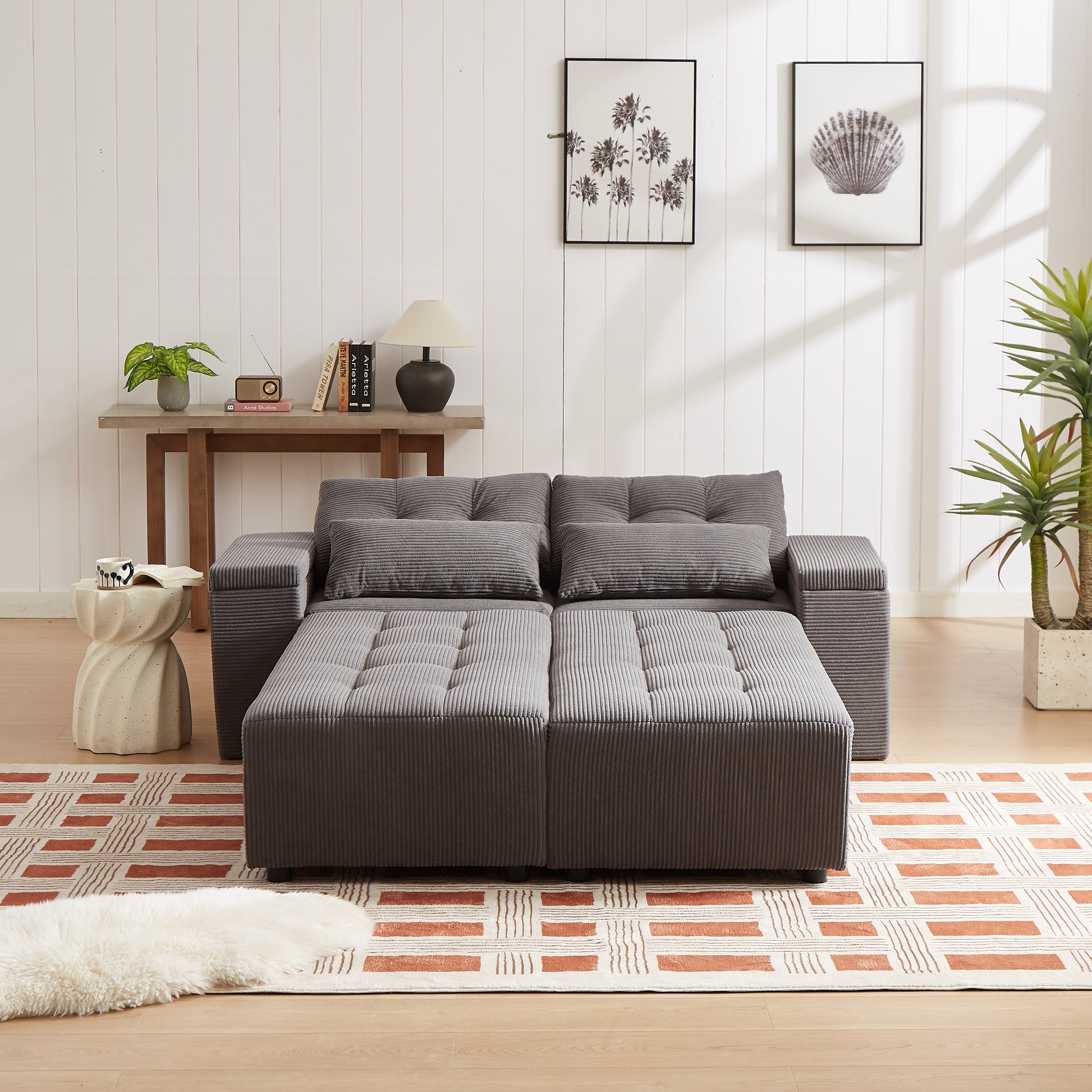 Grey corduroy sectional sofa with tufted seat cushions and plush throw pillows ideal for modern living rooms