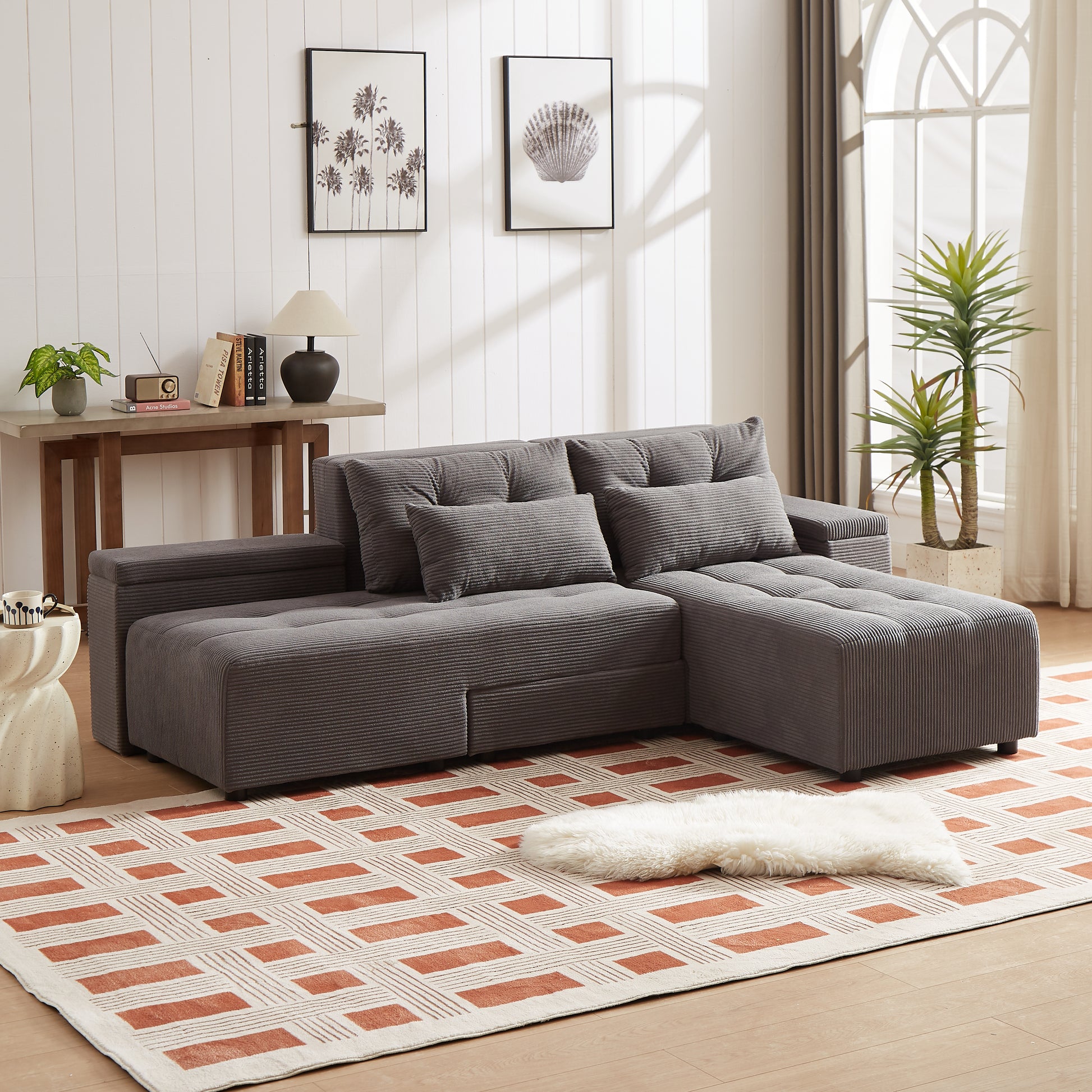 Deep gray corduroy sectional sofa with plush cushions and a chaise lounge