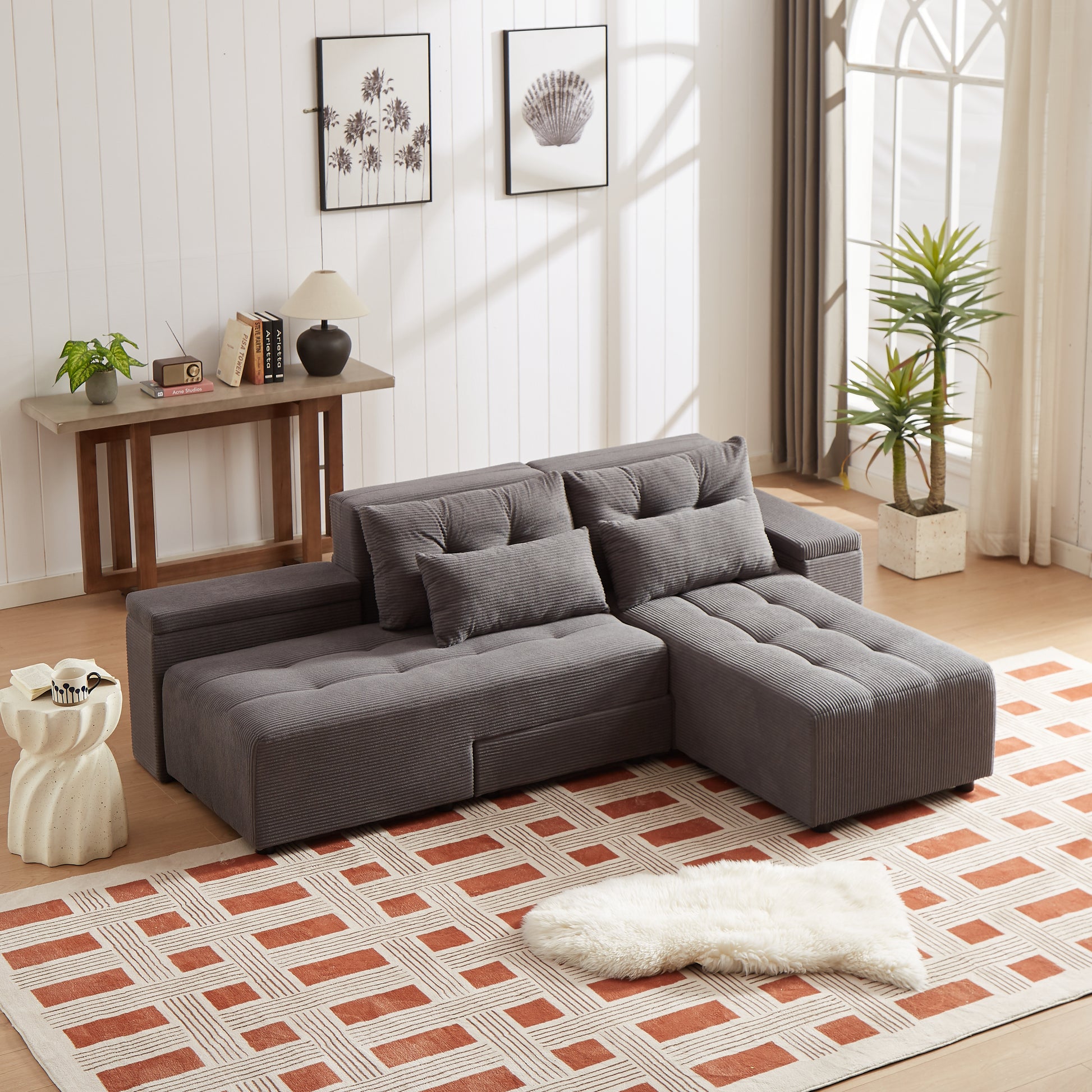 Grey corduroy sectional sofa with plush cushions in a modern living room setting