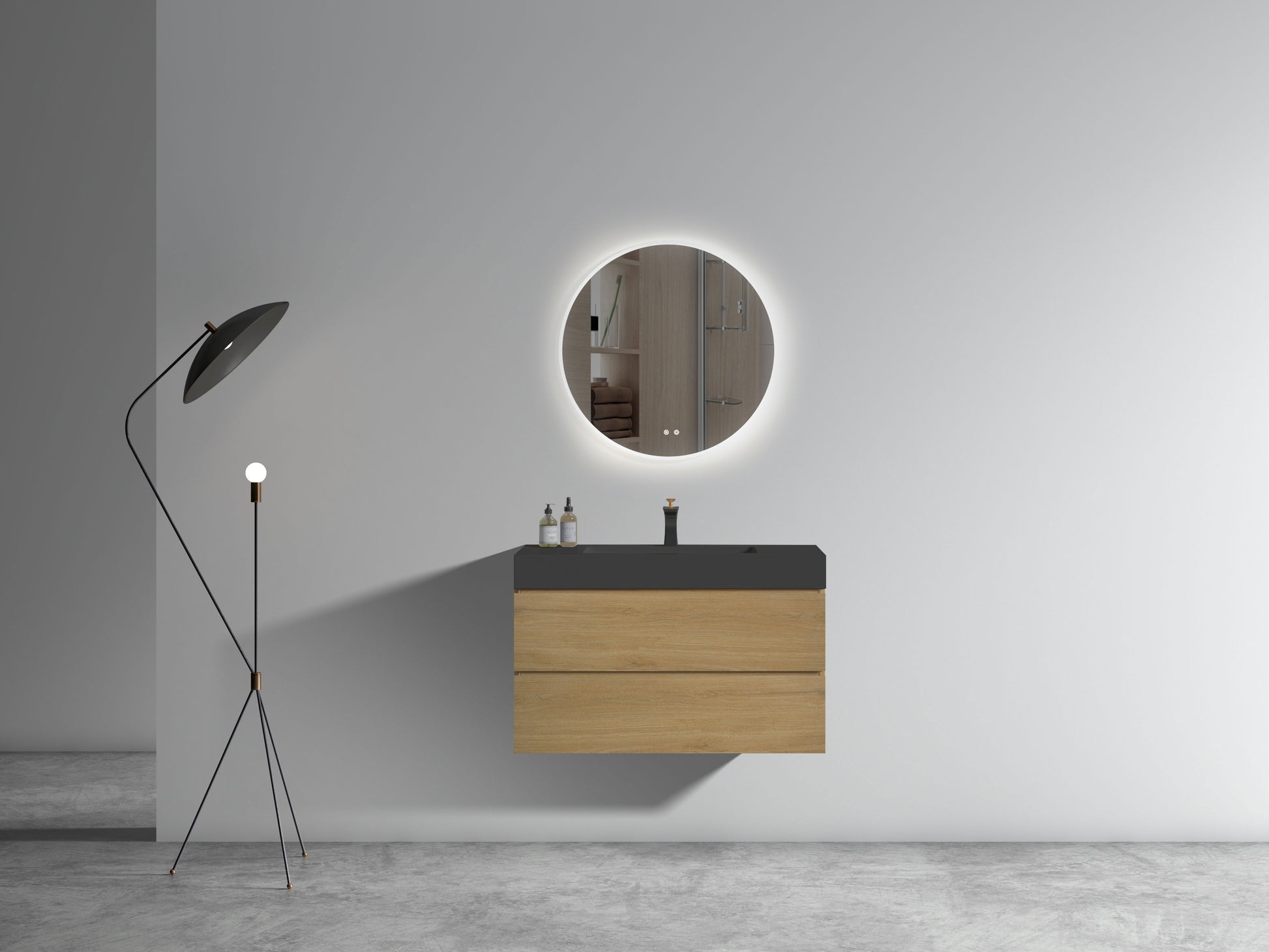 Floating bathroom vanity with natural wood drawers and a matte black countertop