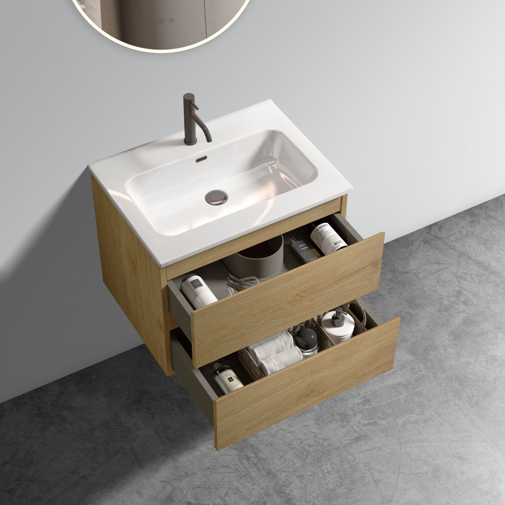Modern oak bathroom vanity with white ceramic sink and dark faucet open drawers reveal toiletries