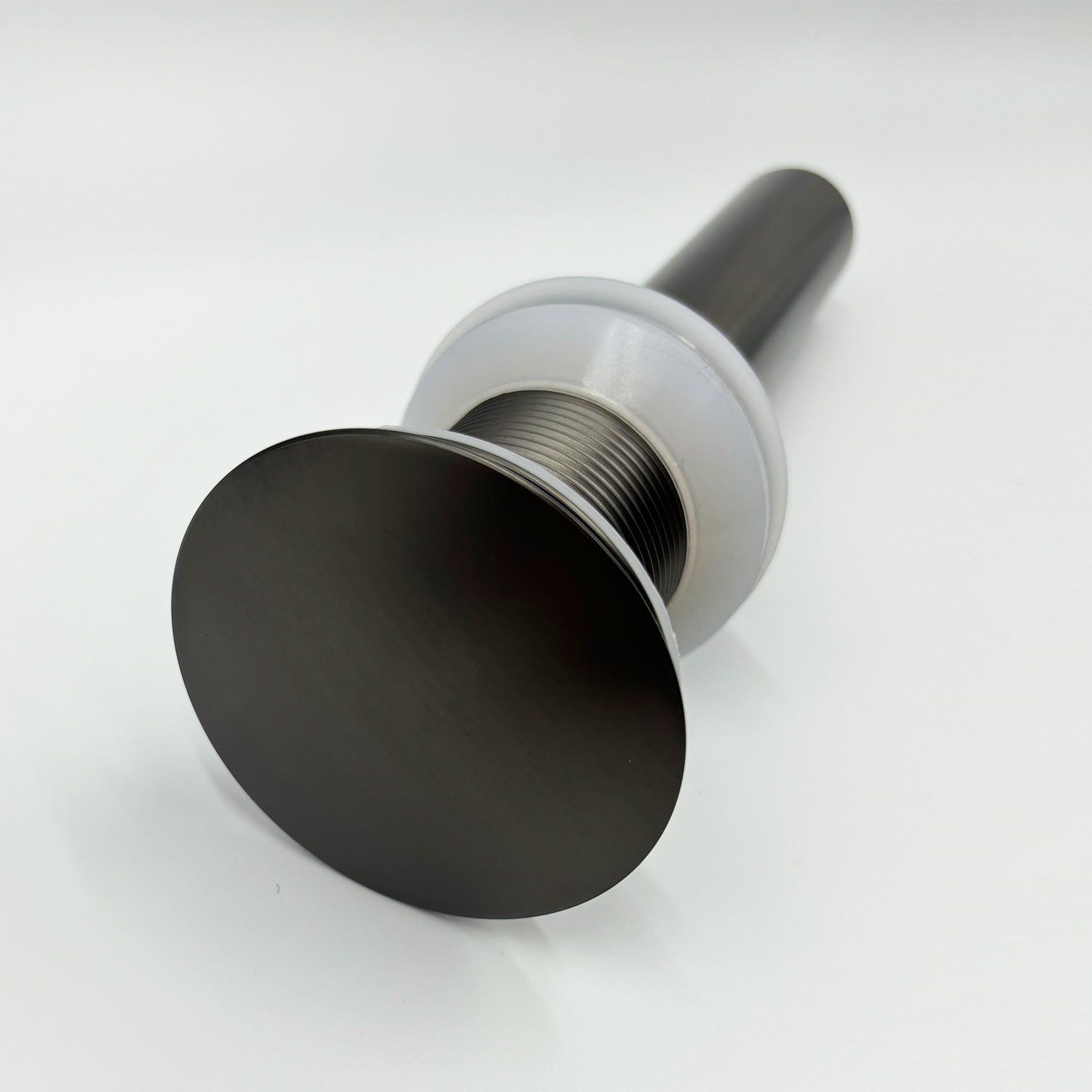 Matte black popup drain with brushed nickel finish for bathroom sinks