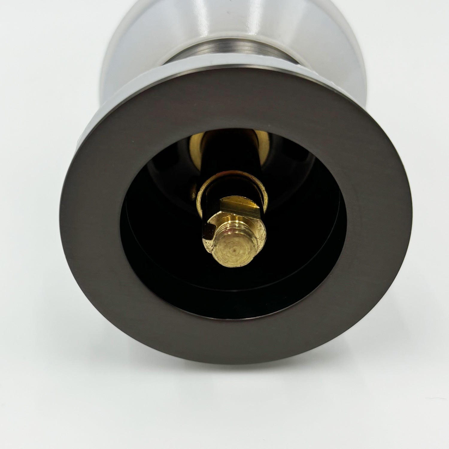 Oilrubbed bronze drain flange with polished chrome escutcheon and brass fitting