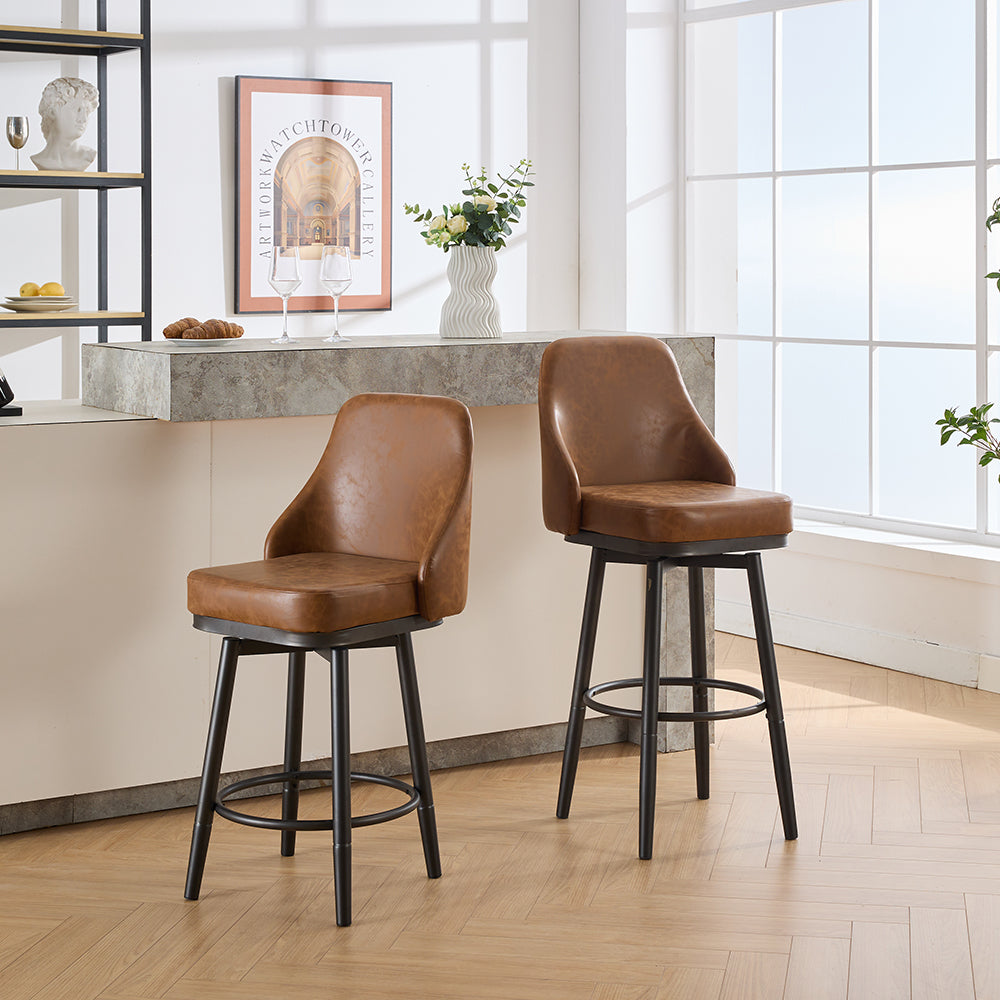 Two brown faux leather swivel bar stools with black metal legs