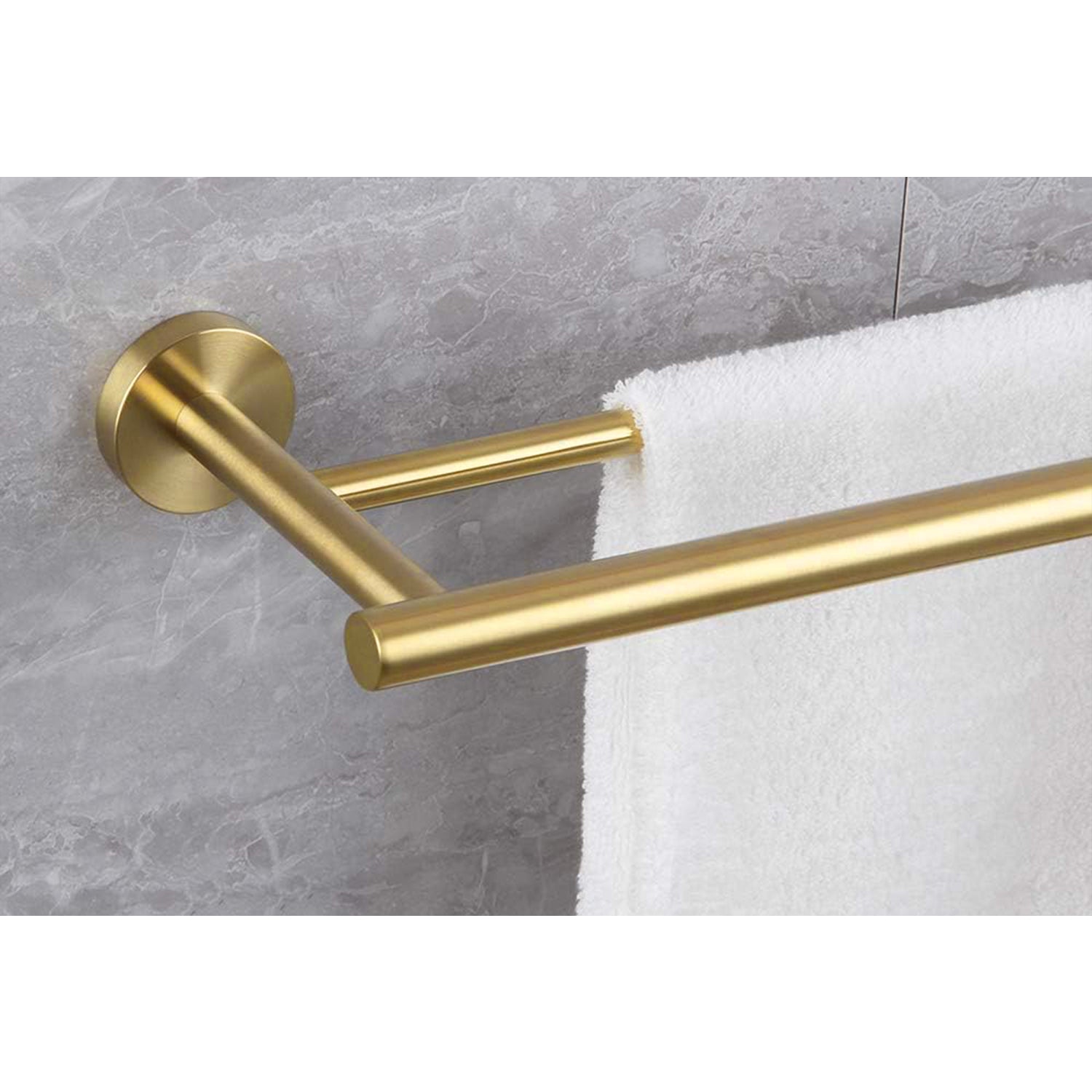 Brushed brass double towel bar with marble tile background