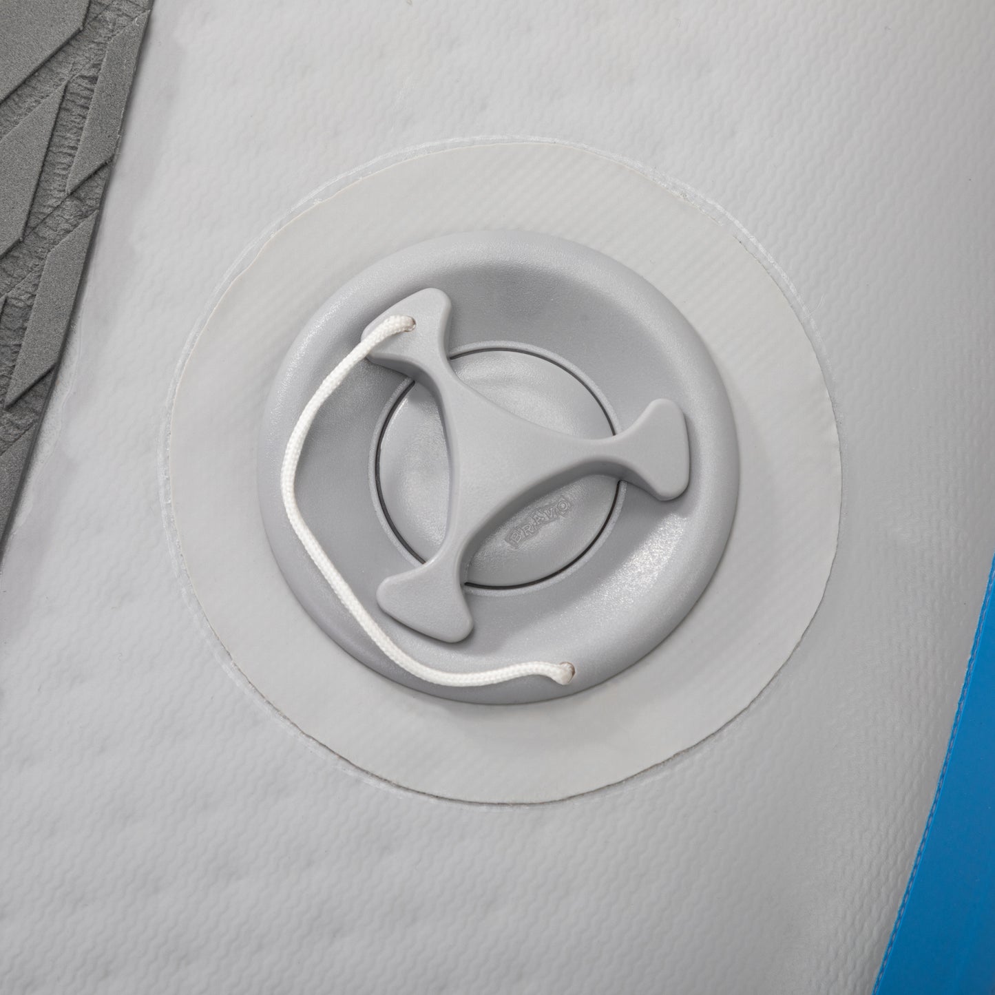 Gray inflatable boat valve with white cord and Bravo logo detail