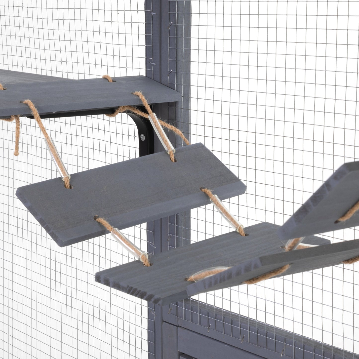 Wooden cat tree platforms with rope accents offering climbing opportunities