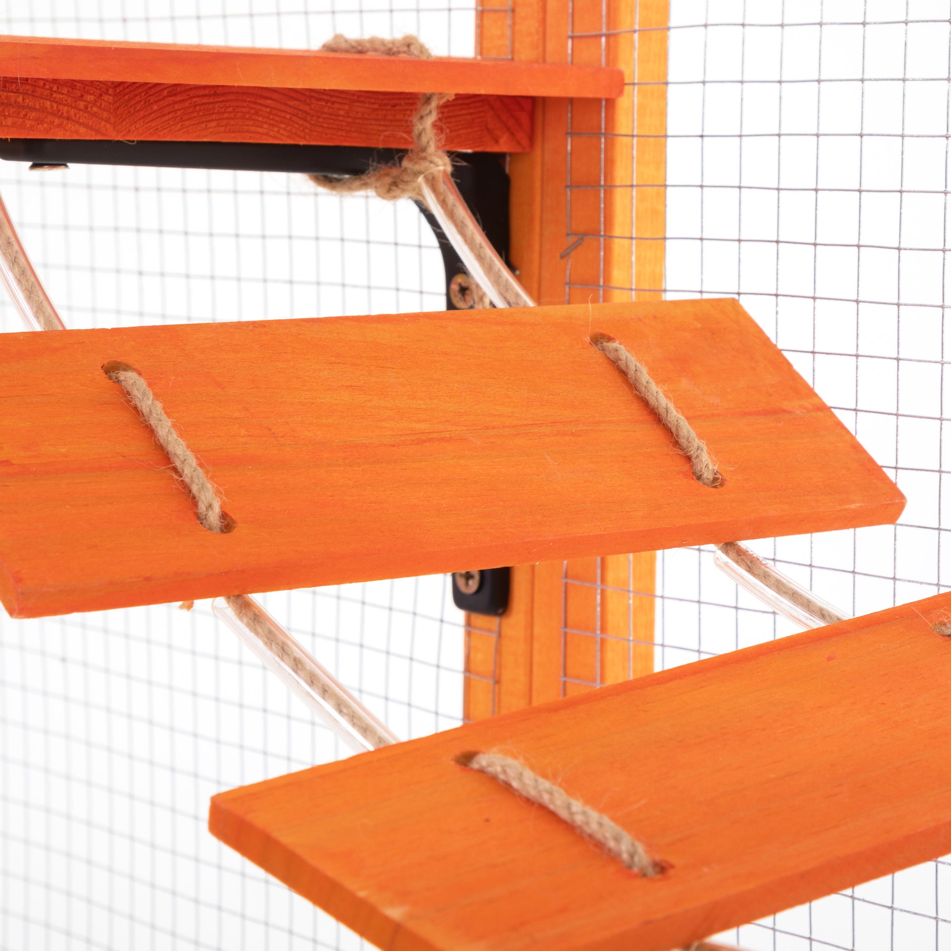 Orange wooden cat tree shelves with jute rope accents and clear support tubes