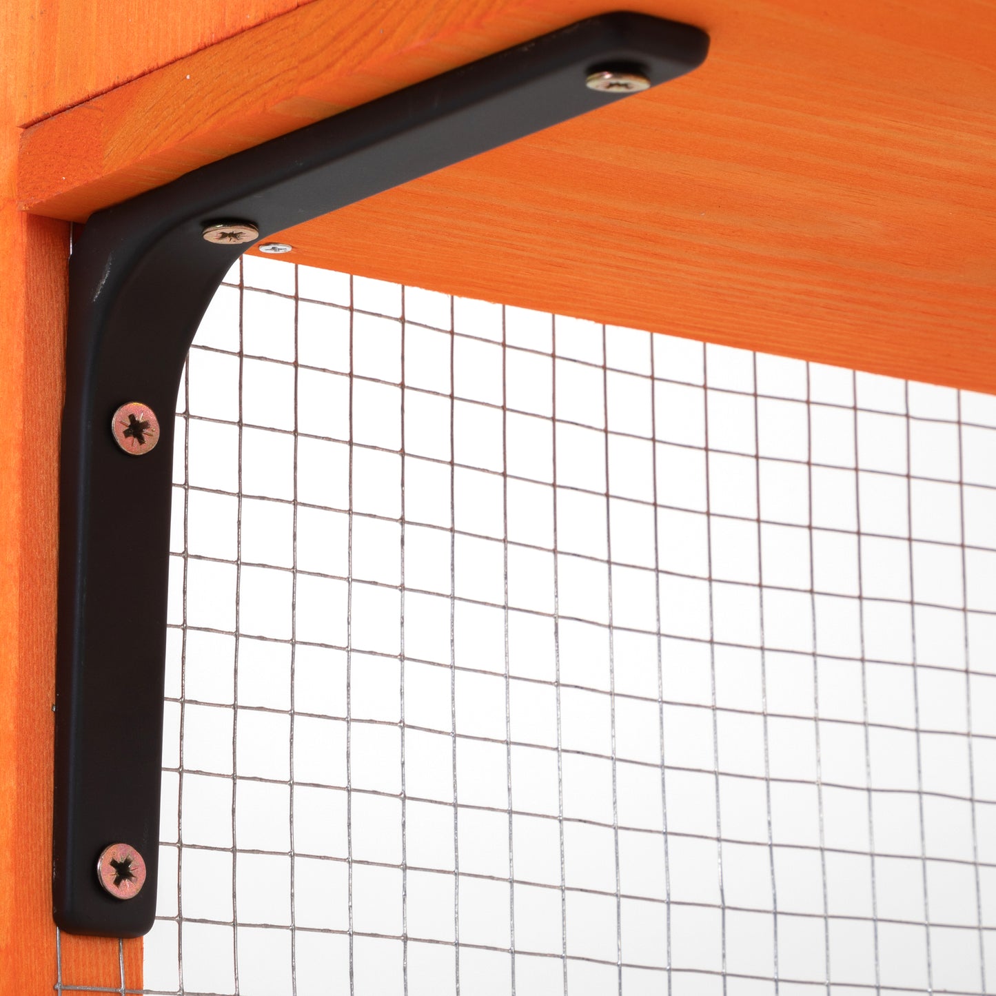 Orange wooden shelf with black metal bracket and wire mesh backing