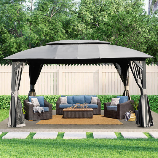 Gray patio gazebo with dark wicker furniture and blue cushions for outdoor entertaining