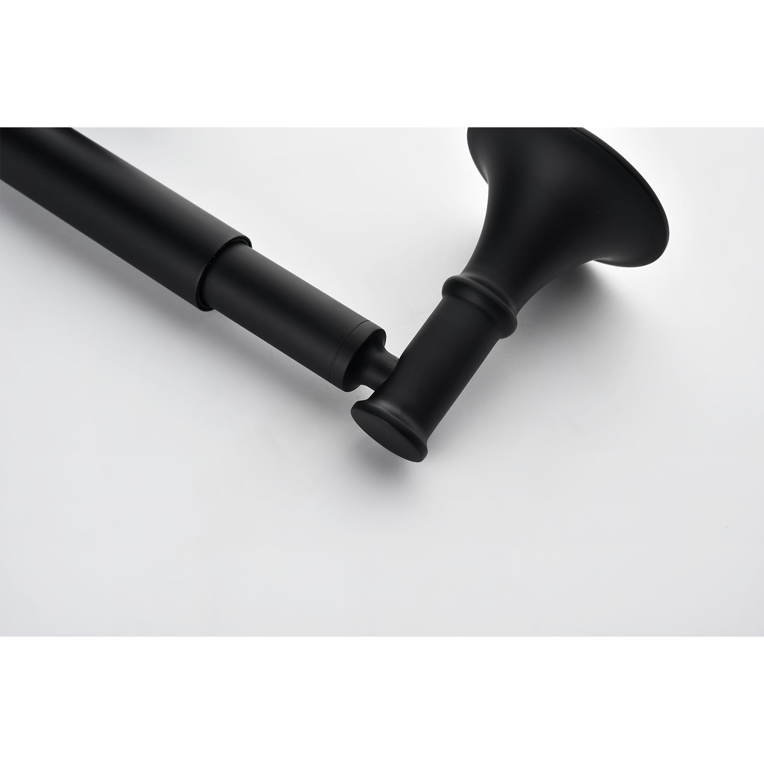 Matte black toilet paper holder with adjustable rod and ornate end cap
