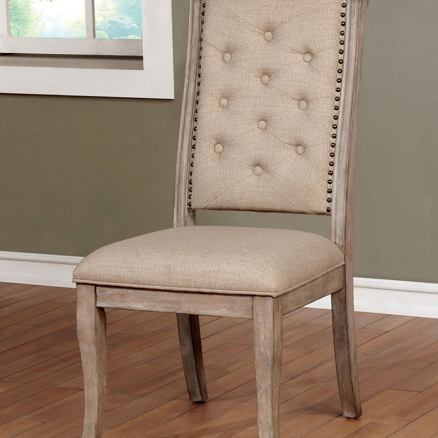 Rustic wooden dining chair with beige linen upholstery and button tufting