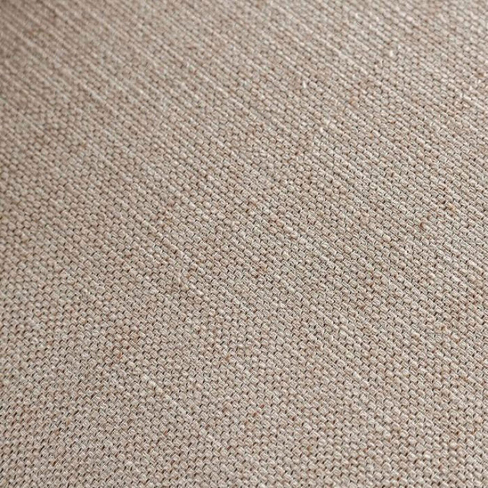 Beige linen upholstery fabric with visible woven texture