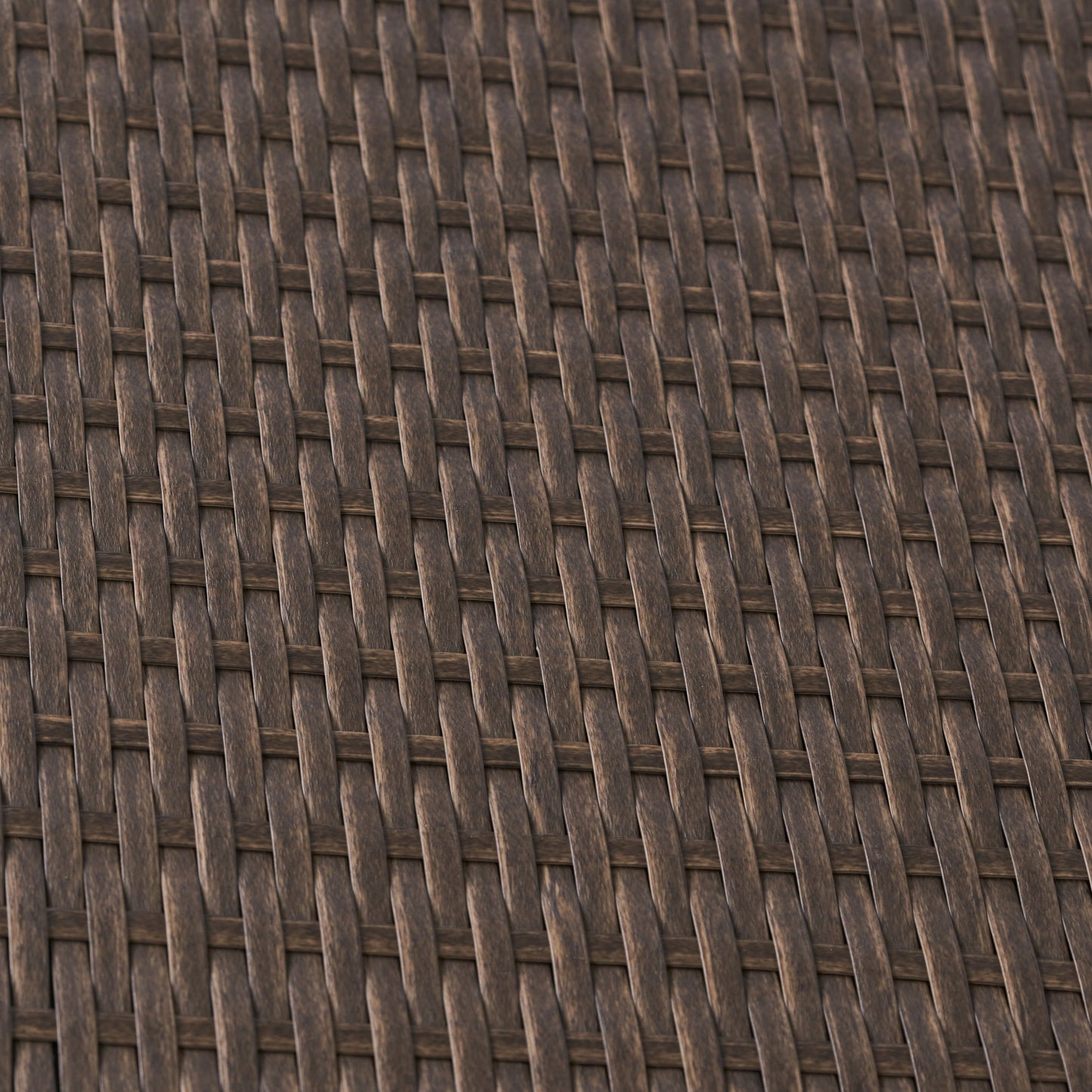 Closeup of dark brown wicker weave texture ideal for furniture backgrounds