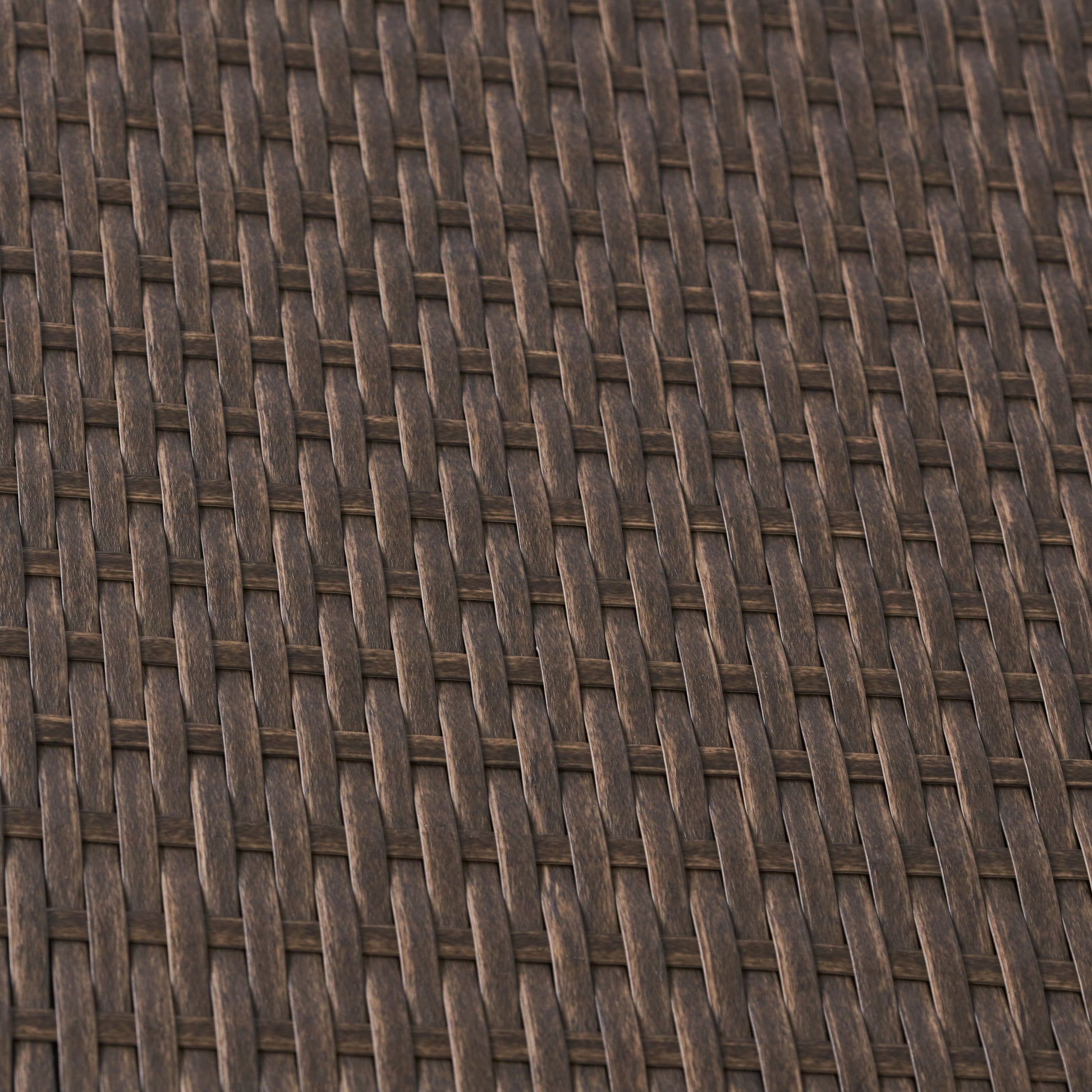 Closeup of dark brown wicker weave texture ideal for furniture backgrounds