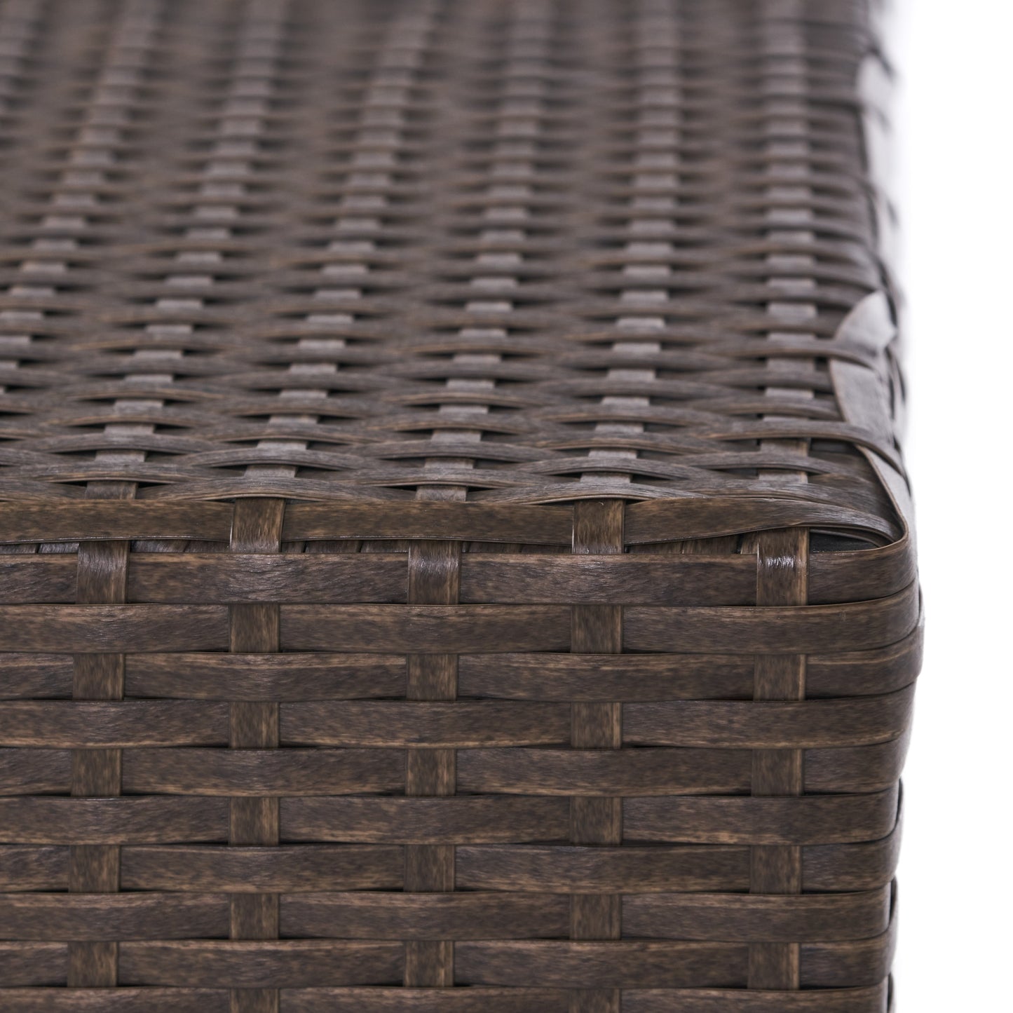 Closeup of dark brown woven wicker texture perfect for outdoor furniture